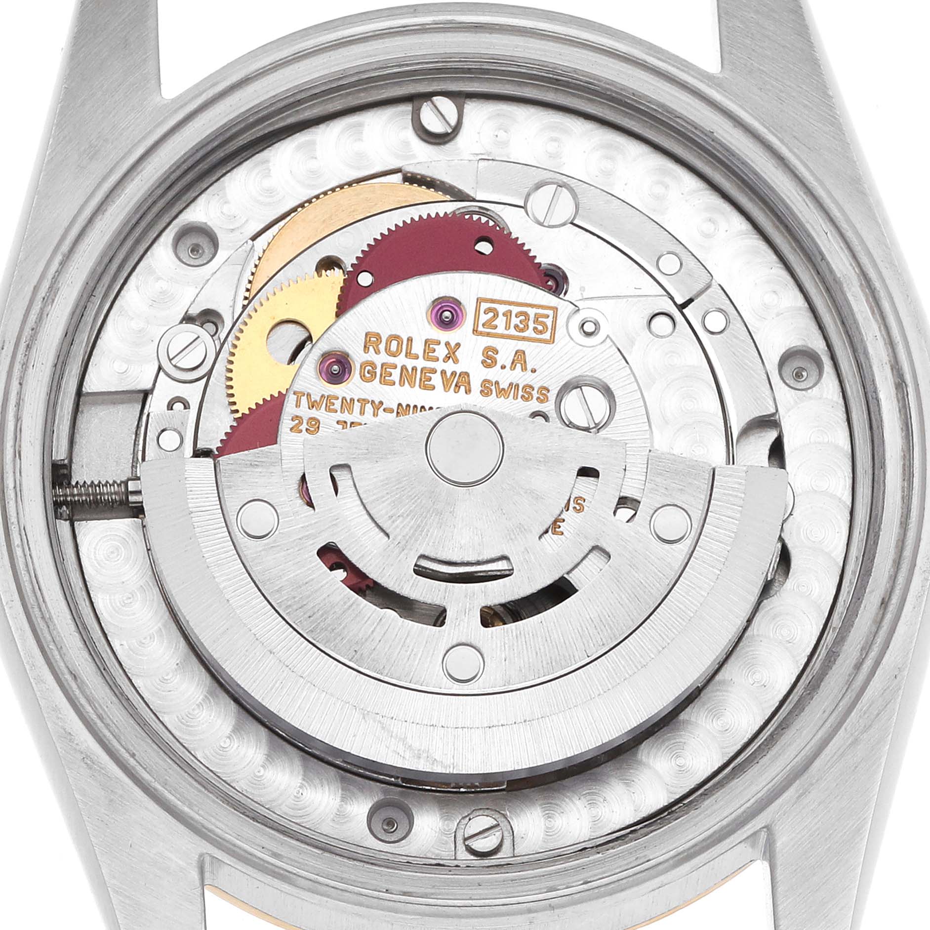 The image shows the movement interior of a Rolex Mid-Size 68273 Women
s Steel and Gold (two tone) White Dial watch, viewed from the back with gears and rotor visible.