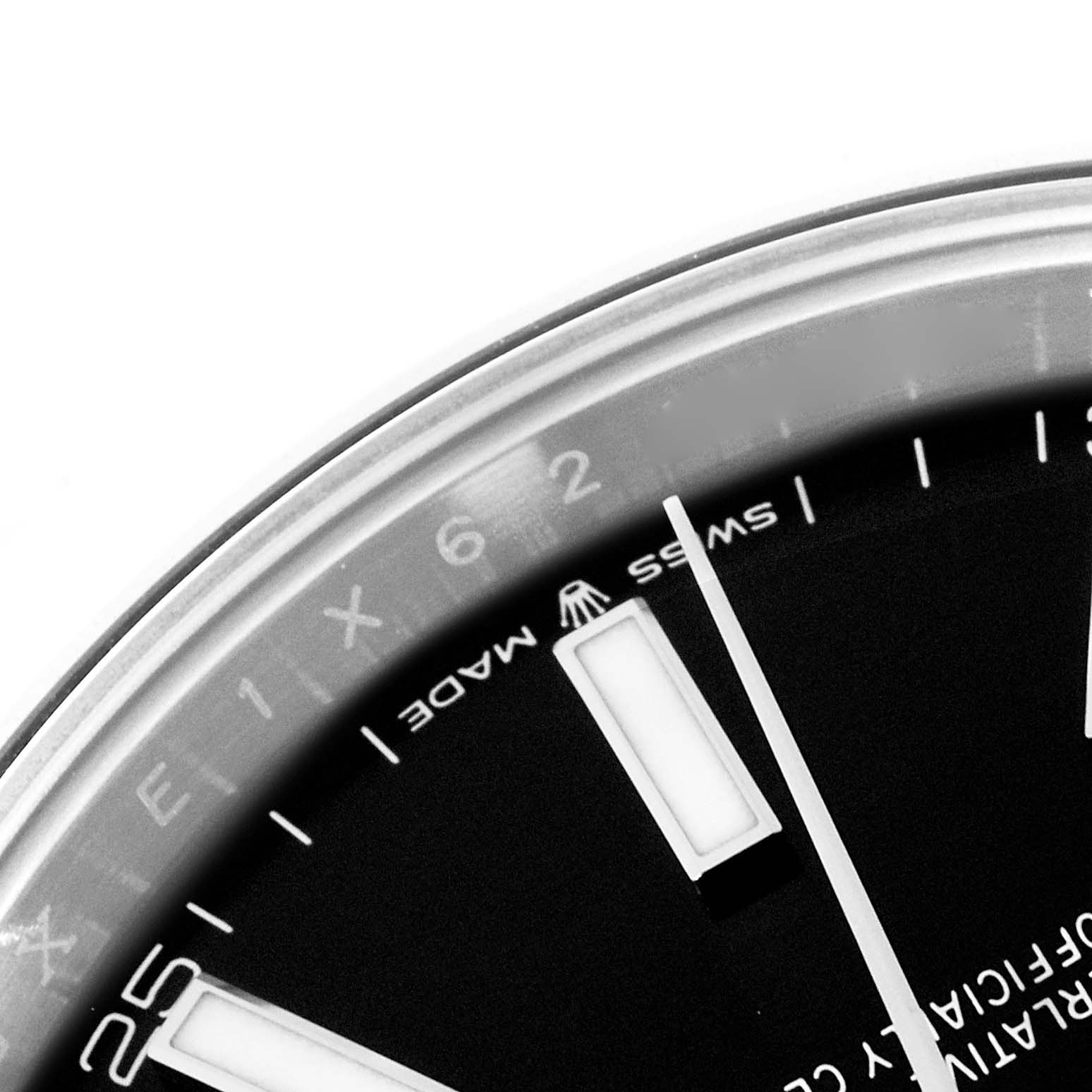 This image shows a close-up of the dial and bezel of a Rolex Datejust 41 126300 Men
s Stainless Steel Black Dial 126300 Men
s Stainless Steel Black Dial watch, focusing on the indices and part of the date window.