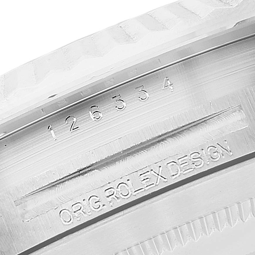 This close-up image shows the engraved reference number and "ORIG ROLEX DESIGN" text on the side of the Rolex Datejust 41 126334 Men's Stainless Steel White Dial 126334 Men's Stainless Steel White Dial model.