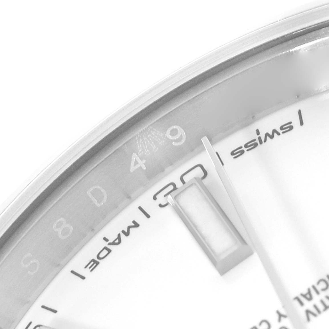 The image shows a close-up angle of the dial and part of the bezel of a Rolex Datejust 41 126300 Men's Stainless Steel White Dial 126300 Men's Stainless Steel White Dial watch, displaying the "Swiss Made" label and hour markers.