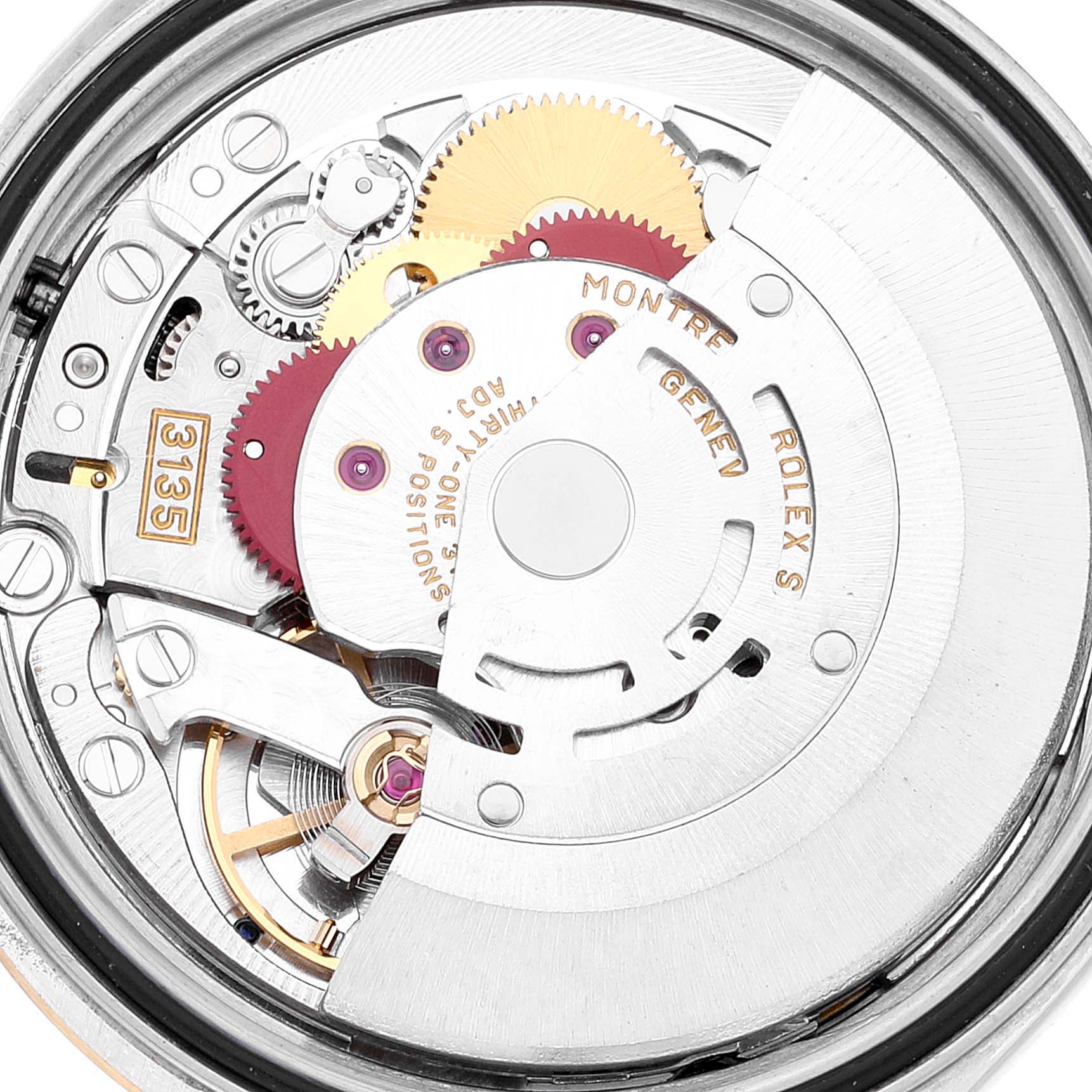 This image shows the movement mechanism of the Rolex Datejust 16233 Men's Steel and Gold (two tone) Blue Dial 16233 Men's Steel and Gold (two tone) Blue Dial watch, highlighting gears and the rotor.