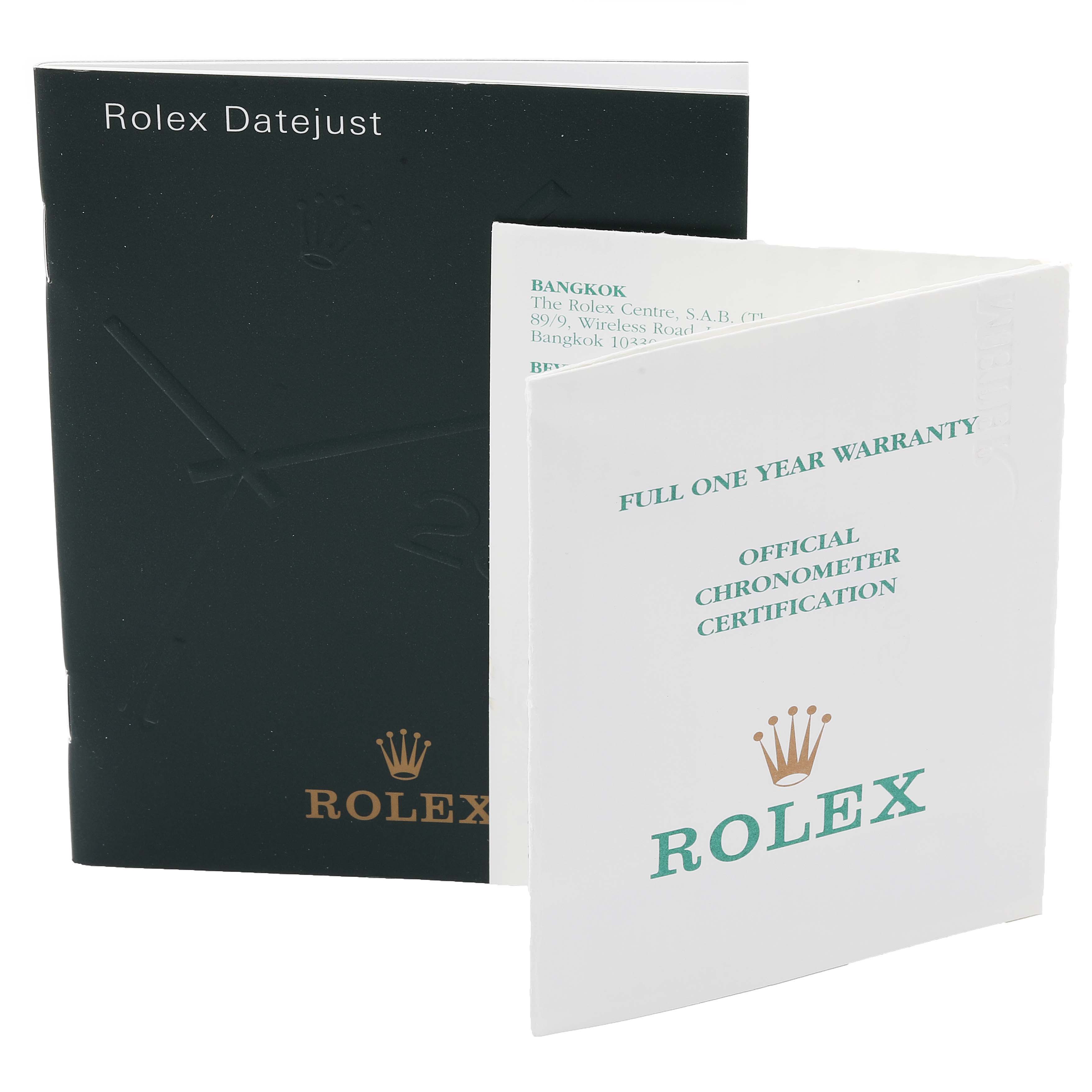 The image shows warranty and certification booklets for the Rolex Datejust 16233 Men's Steel and Gold (two tone) Blue Dial 16233 Men's Steel and Gold (two tone) Blue Dial model.