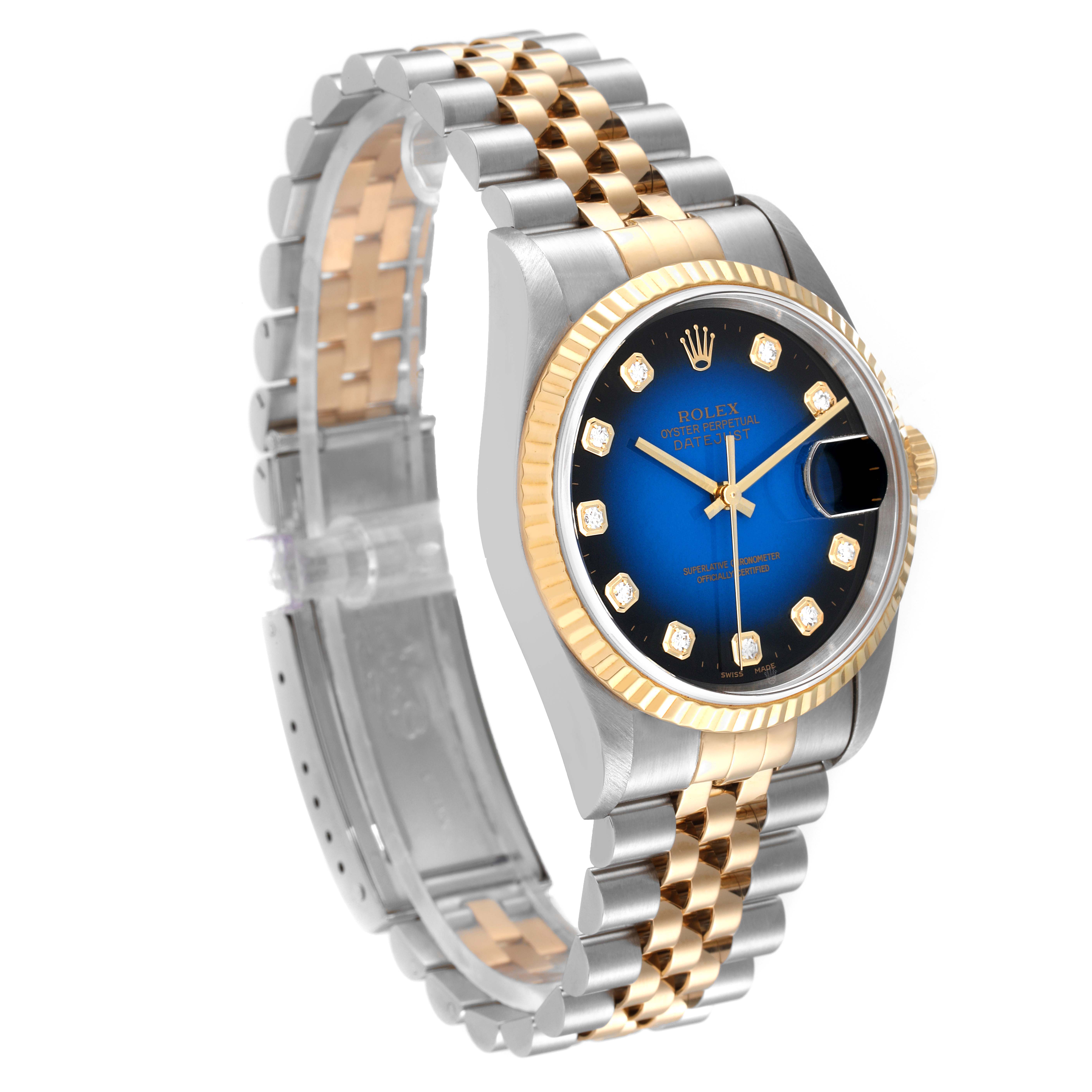 This image shows the Rolex Datejust 16233 Men's Steel and Gold (two tone) Blue Dial 16233 Men's Steel and Gold (two tone) Blue Dial watch at a three-quarter angle highlighting its two-tone bracelet and blue dial.