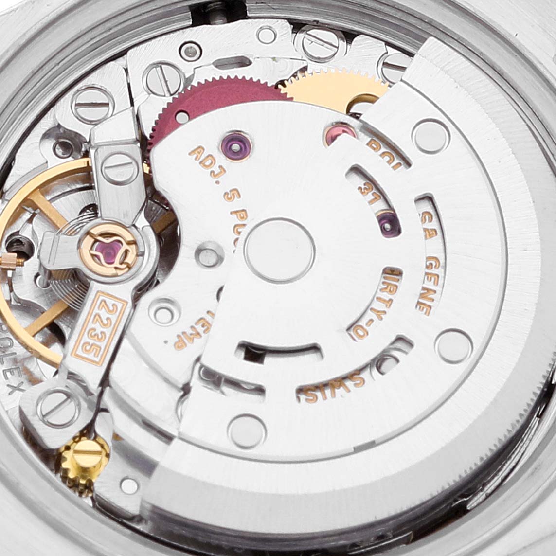 This is a detailed close-up of the movement mechanism in a Rolex Datejust 79163 Women's Steel and Gold (two tone) White Dial 79163 Women's Steel and Gold (two tone) White Dial watch.