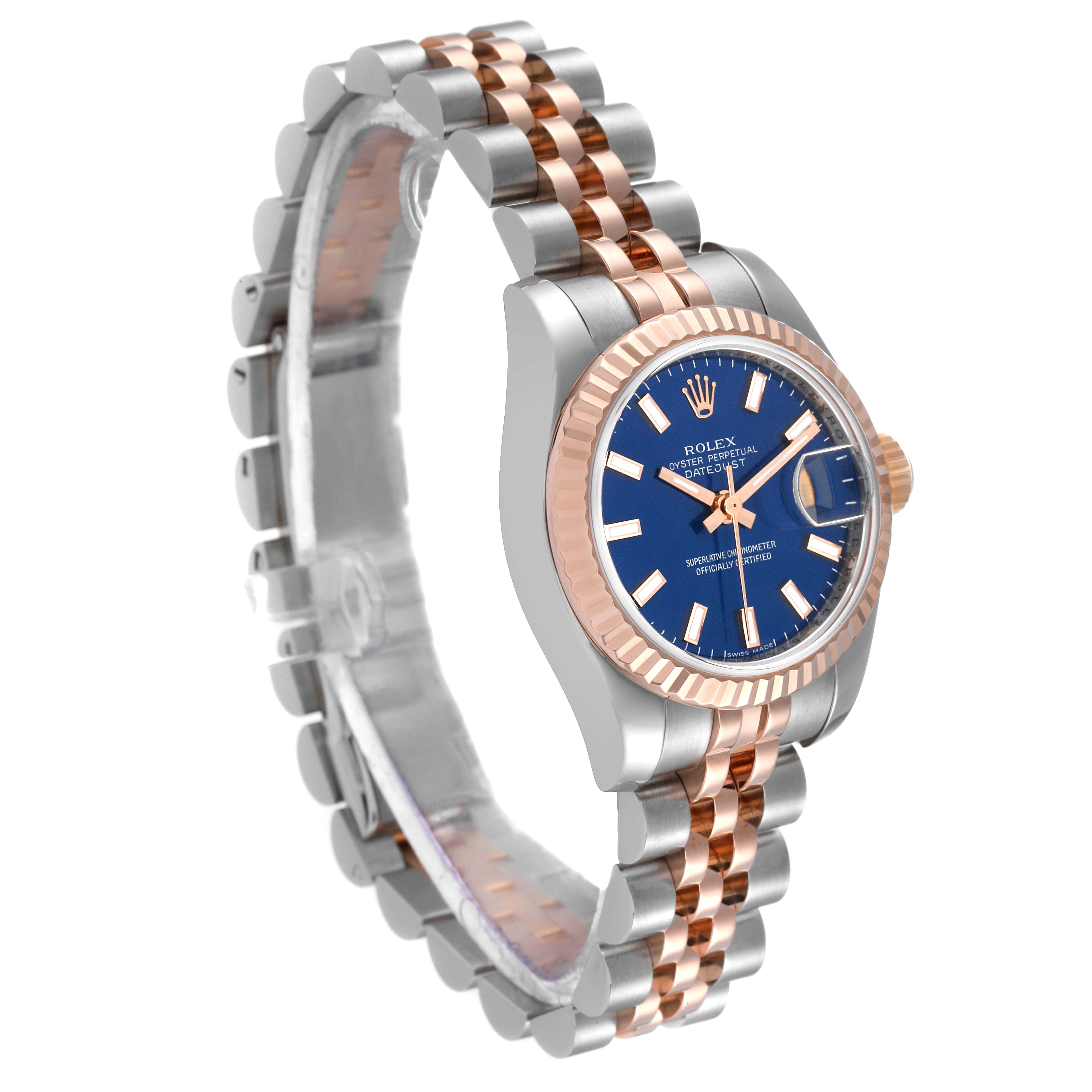 The image shows a Rolex Datejust 179171 Women's Steel and Gold (two tone) Blue Dial 179171 Women's Steel and Gold (two tone) Blue Dial watch angled at a three-quarter view, highlighting its blue dial, fluted bezel, and two-tone Jubilee bracelet.