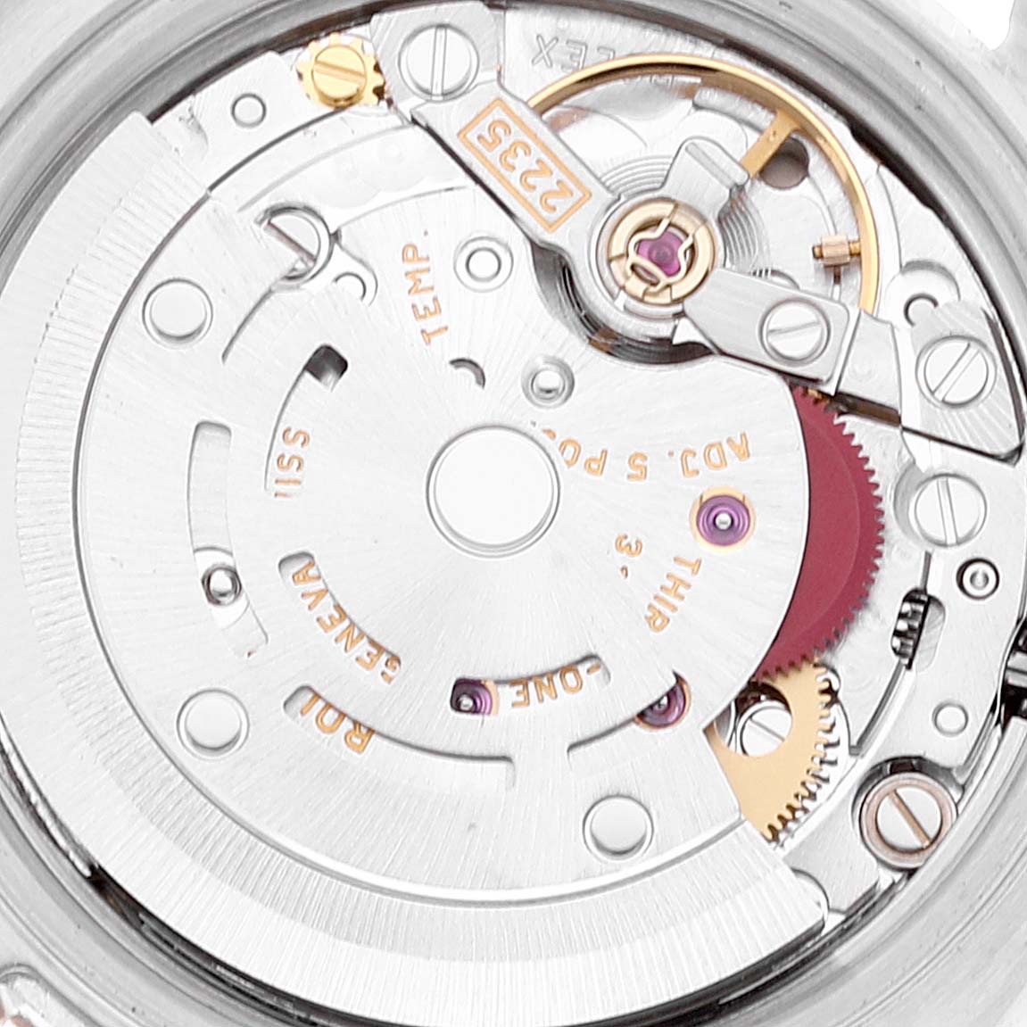 The image shows the internal mechanism of a Rolex Datejust 179171 Women's Steel and Gold (two tone) Blue Dial 179171 Women's Steel and Gold (two tone) Blue Dial watch, specifically the movement and gears.