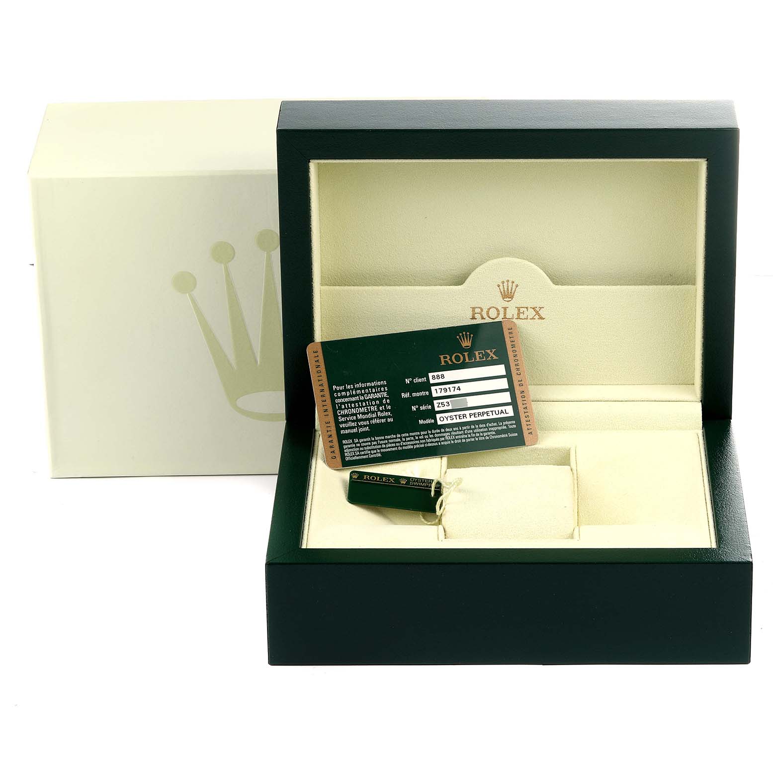 The image shows the packaging, certificate, and accessories of a Rolex Datejust 179174 Women
s Stainless Steel White Dial 179174 Women
s Stainless Steel White Dial watch.