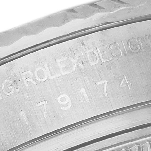 This image shows a close-up of the engraved model number on the case of a Rolex Datejust 179174 Women
s Stainless Steel White Dial 179174 Women
s Stainless Steel White Dial watch.