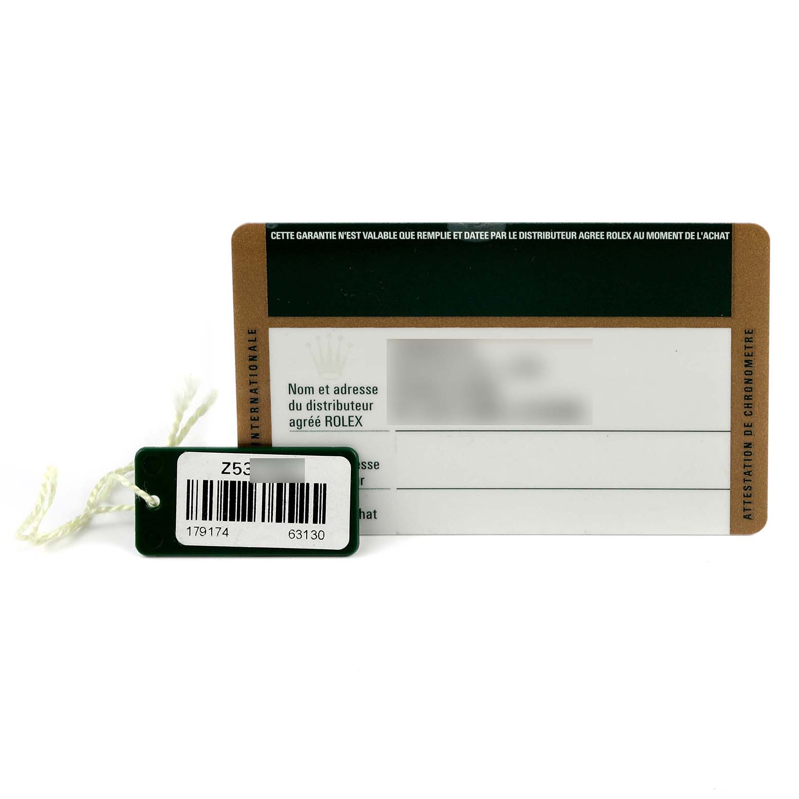 The image shows a warranty card and a green serialized tag for the Rolex Datejust 179174 Women
s Stainless Steel White Dial 179174 Women
s Stainless Steel White Dial model.