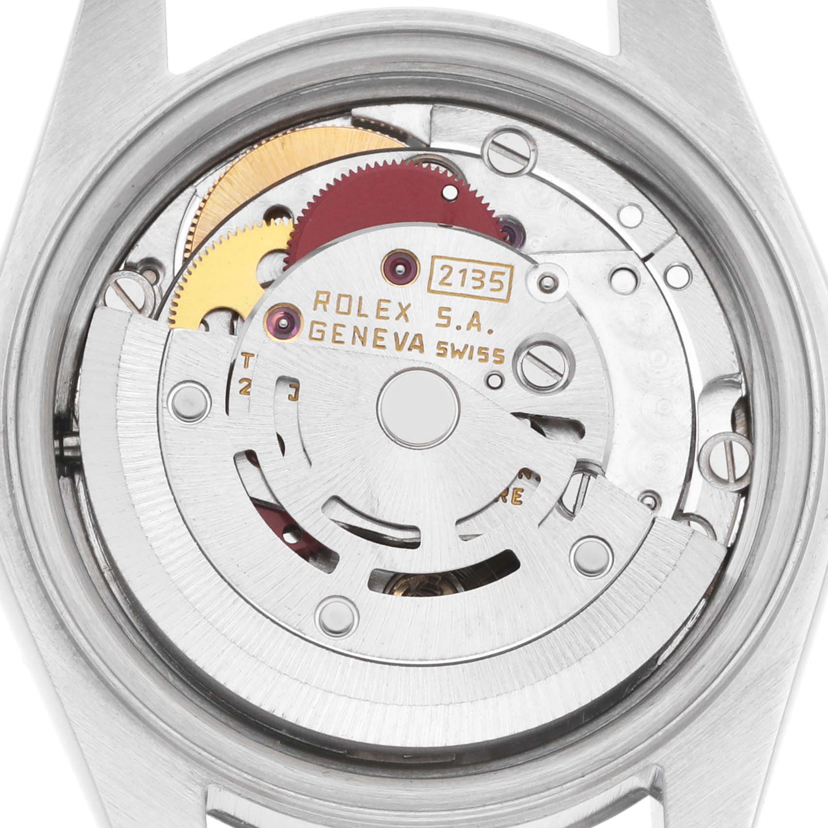 The image shows a close-up of the movement inside a Rolex Datejust 69174 Women's Stainless Steel Silver Dial watch, highlighting the rotor and gears.