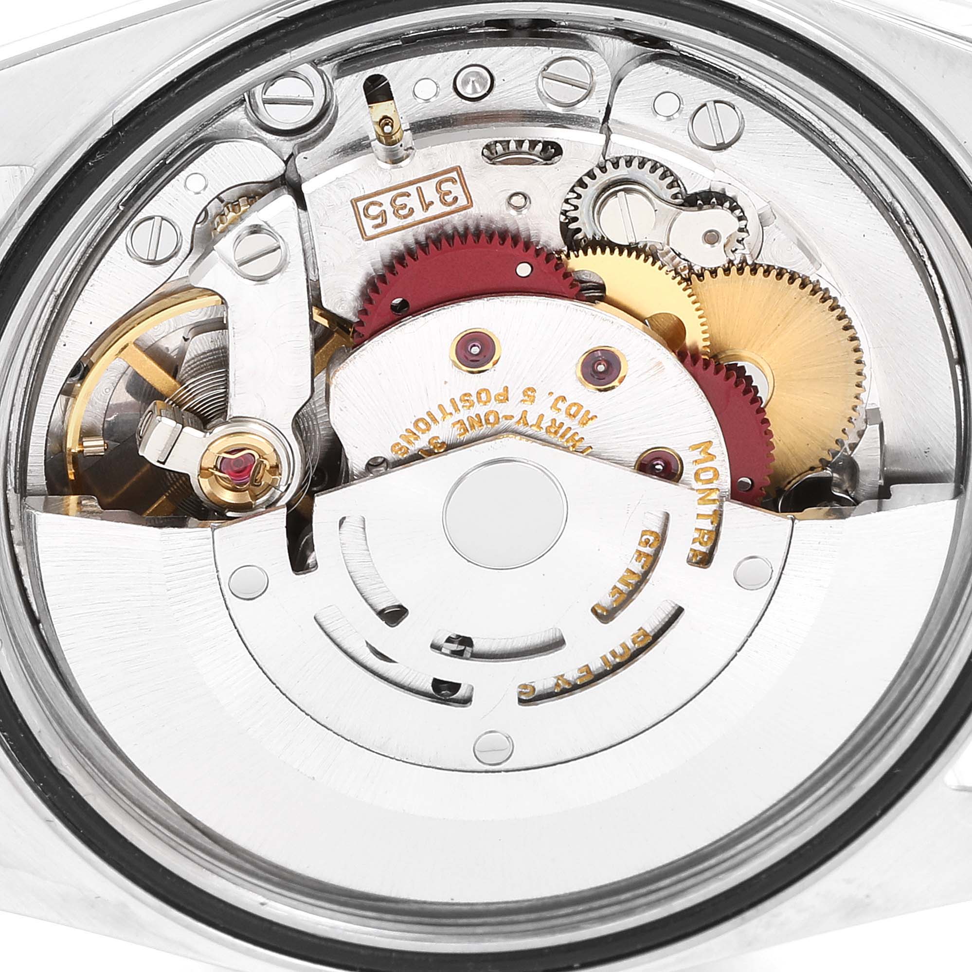 The image shows a close-up of the movement mechanism of a Rolex Datejust 16233 Men's Steel and Gold (two tone) Champagne Dial 16233 Men's Steel and Gold (two tone) Champagne Dial watch.