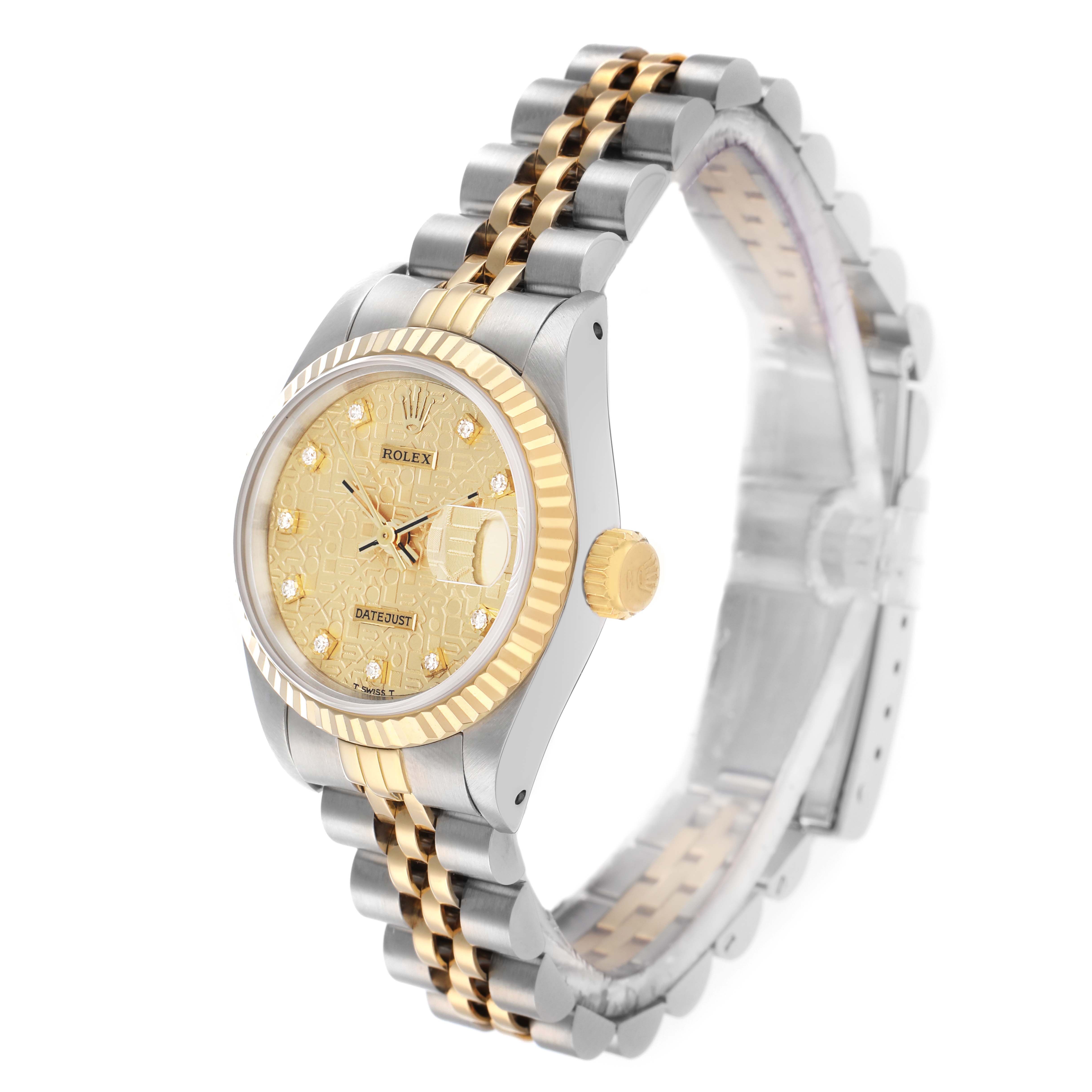 The Rolex Datejust 69173 Women
s Steel and Gold (two tone) Champagne Dial watch is shown at a three-quarter angle, displaying the face, fluted bezel, crown, and jubilee bracelet.