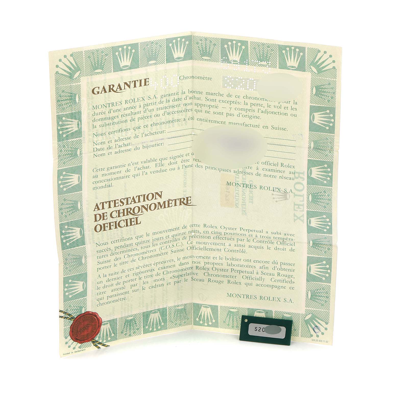 The image shows the warranty certificate and chronometer certification for a Rolex Datejust 69173 Women
s Steel and Gold (two tone) Champagne Dial.