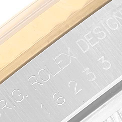 Close-up angle showing the engraved model number and brand name on the bezel and case of the Rolex Datejust 16233 Men
s Stainless Steel Champagne Dial 16233 Men
s Stainless Steel Champagne Dial watch.