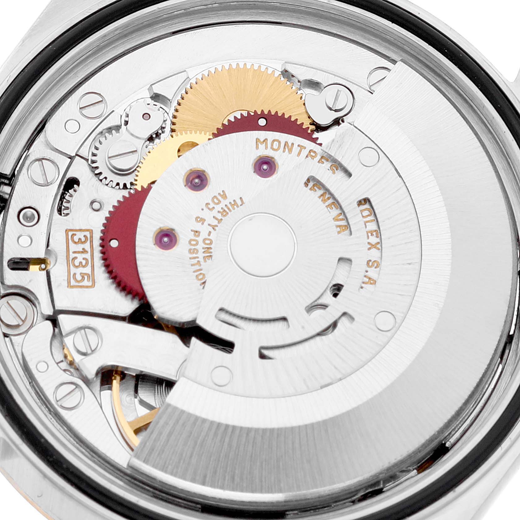 The image shows the internal movement mechanism of a Rolex Datejust 16233 Men
s Stainless Steel Champagne Dial 16233 Men
s Stainless Steel Champagne Dial watch from a rear, close-up angle.