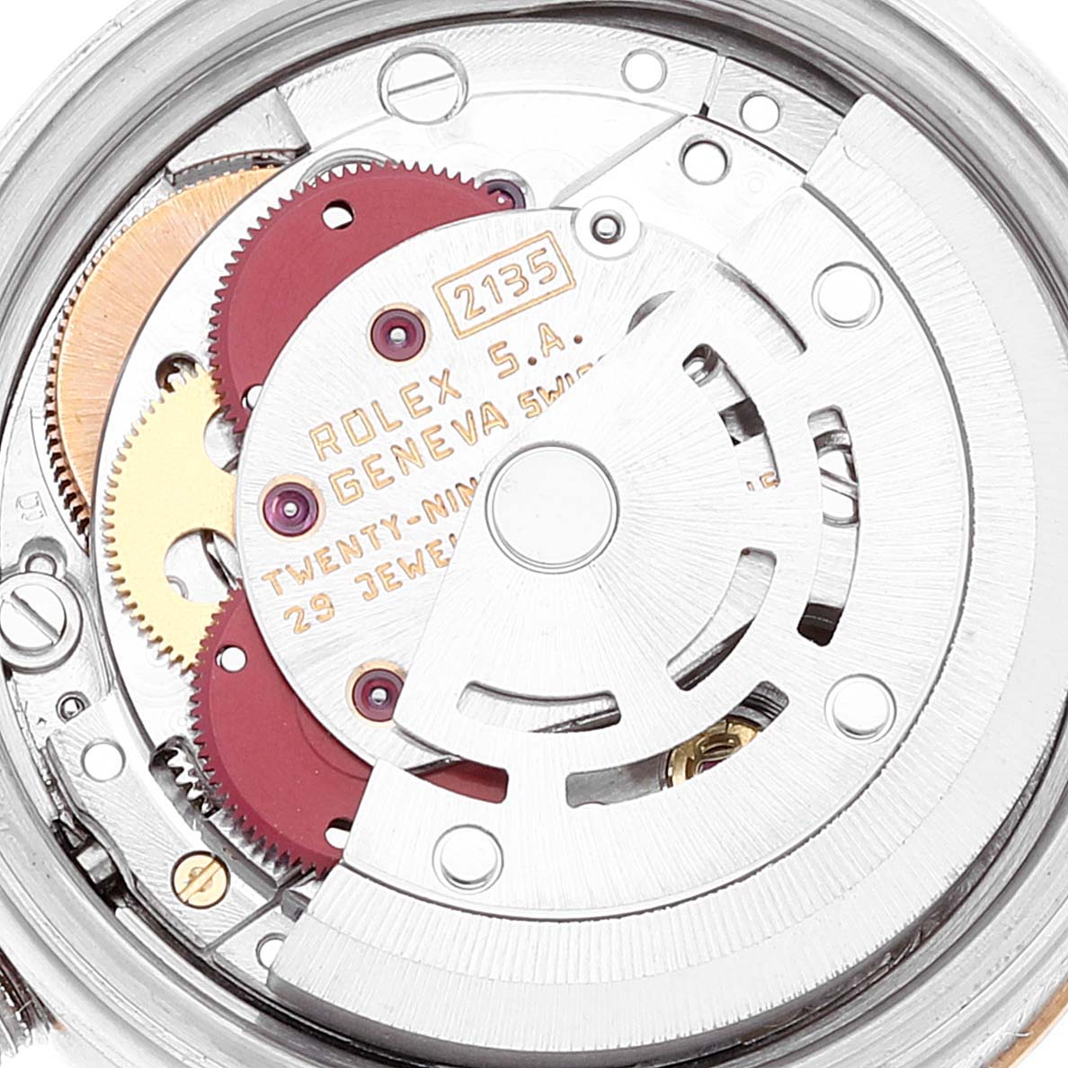 This image shows the inner mechanical movement of a Rolex Datejust 69173 Women's Steel and Gold (two tone) Champagne Dial 69173 Women's Steel and Gold (two tone) Champagne Dial watch, highlighting gears and the rotor.