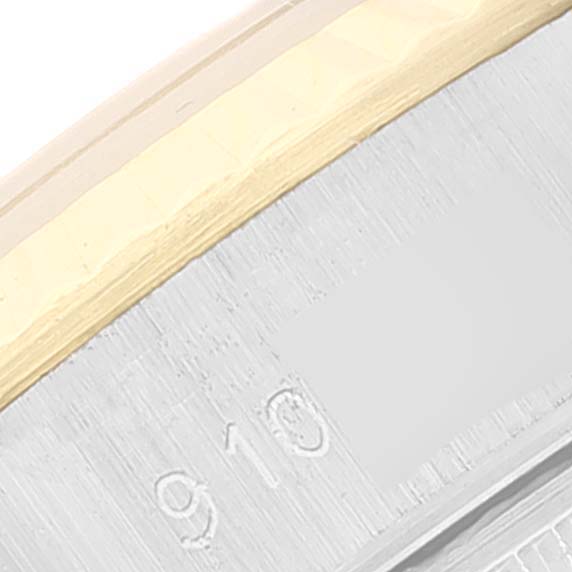 This close-up image shows the inscription on the edge of the bezel of a Rolex Datejust 69173 Women's Steel and Gold (two tone) Champagne Dial 69173 Women's Steel and Gold (two tone) Champagne Dial watch.