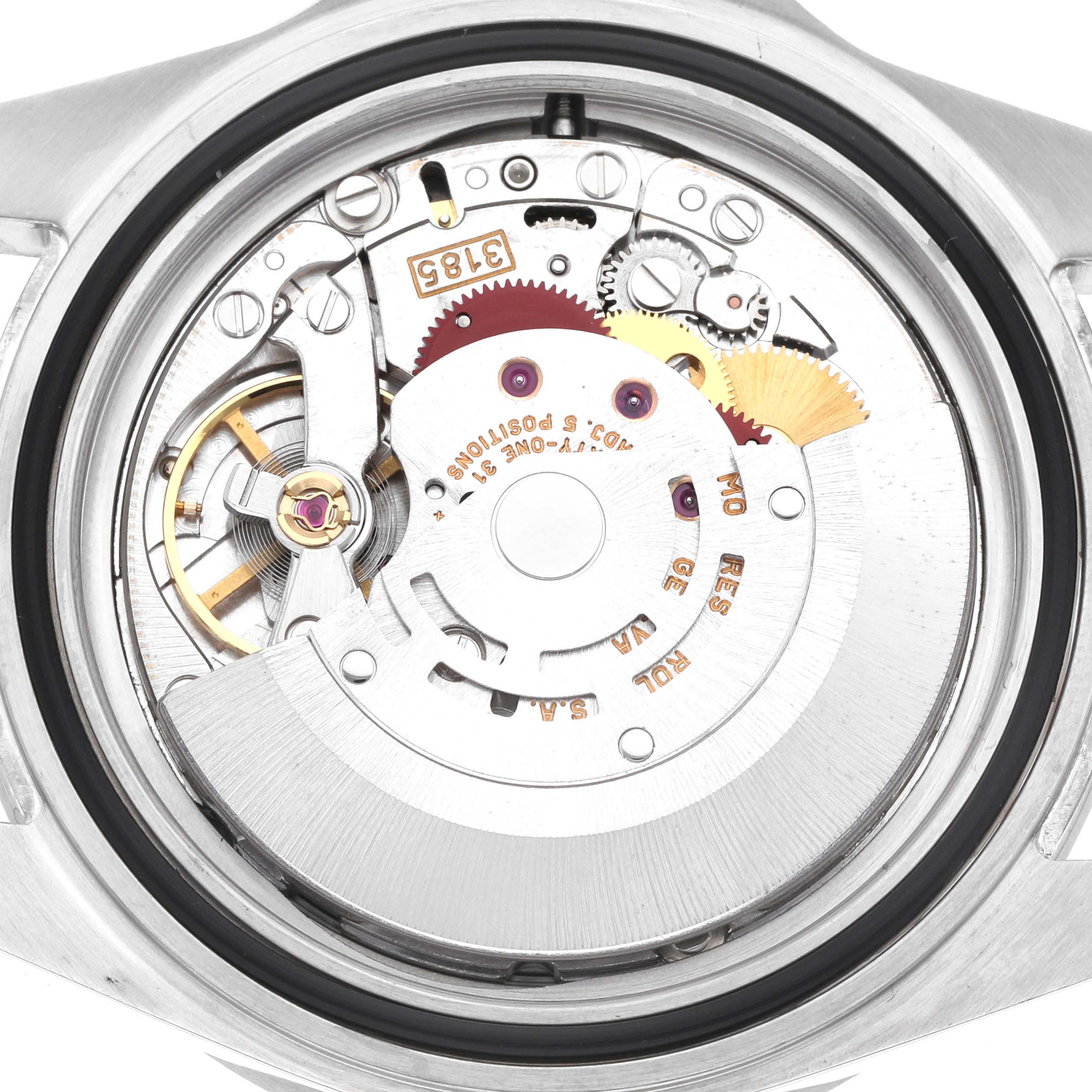 The image shows the back view of the Rolex Explorer 16570 Men
s Stainless Steel Black Dial, focusing on its internal automatic movement mechanism.