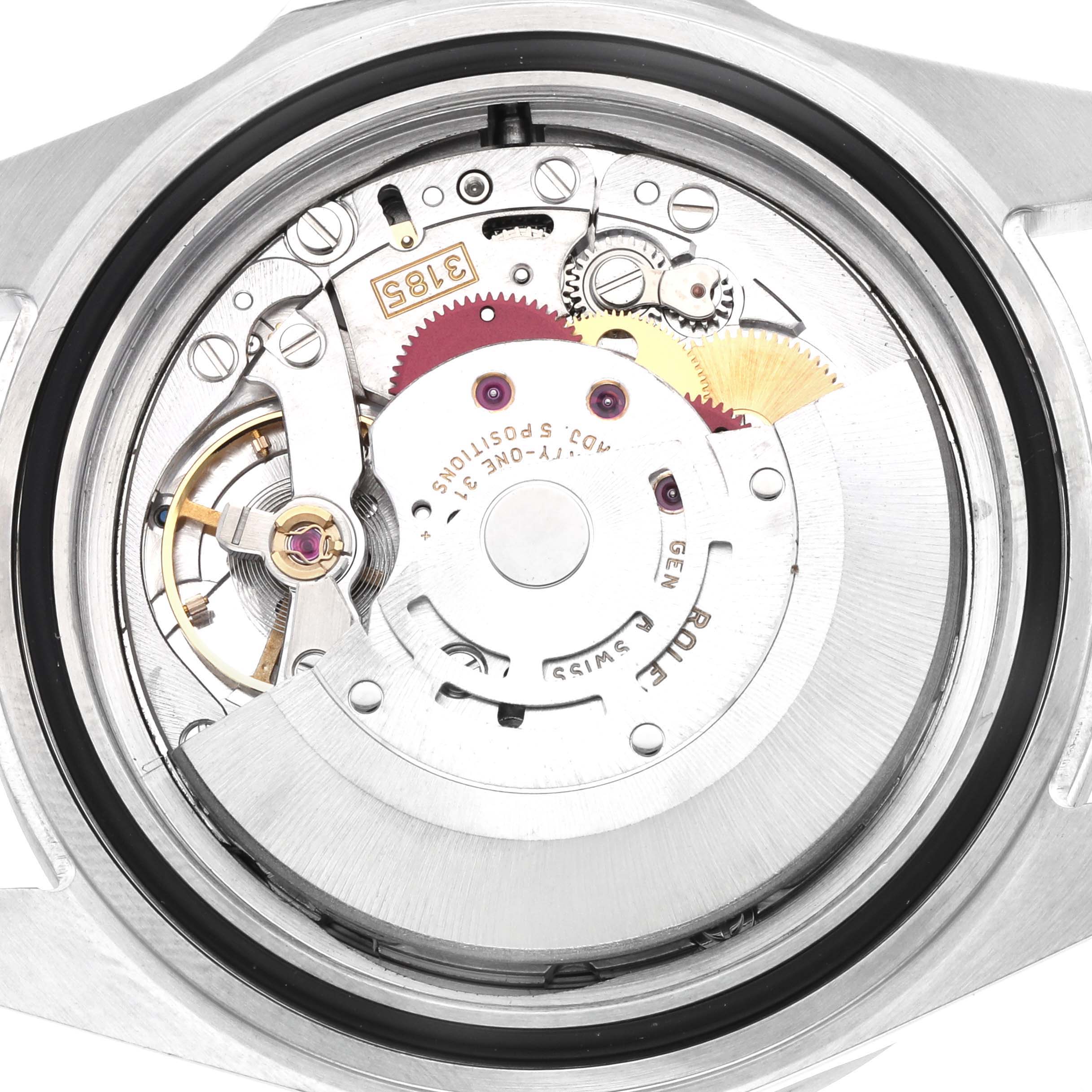 The image shows the intricate movement mechanism of a Rolex Explorer 16570 Men
s Stainless Steel Black Dial watch from a back angle, highlighting gears and components.