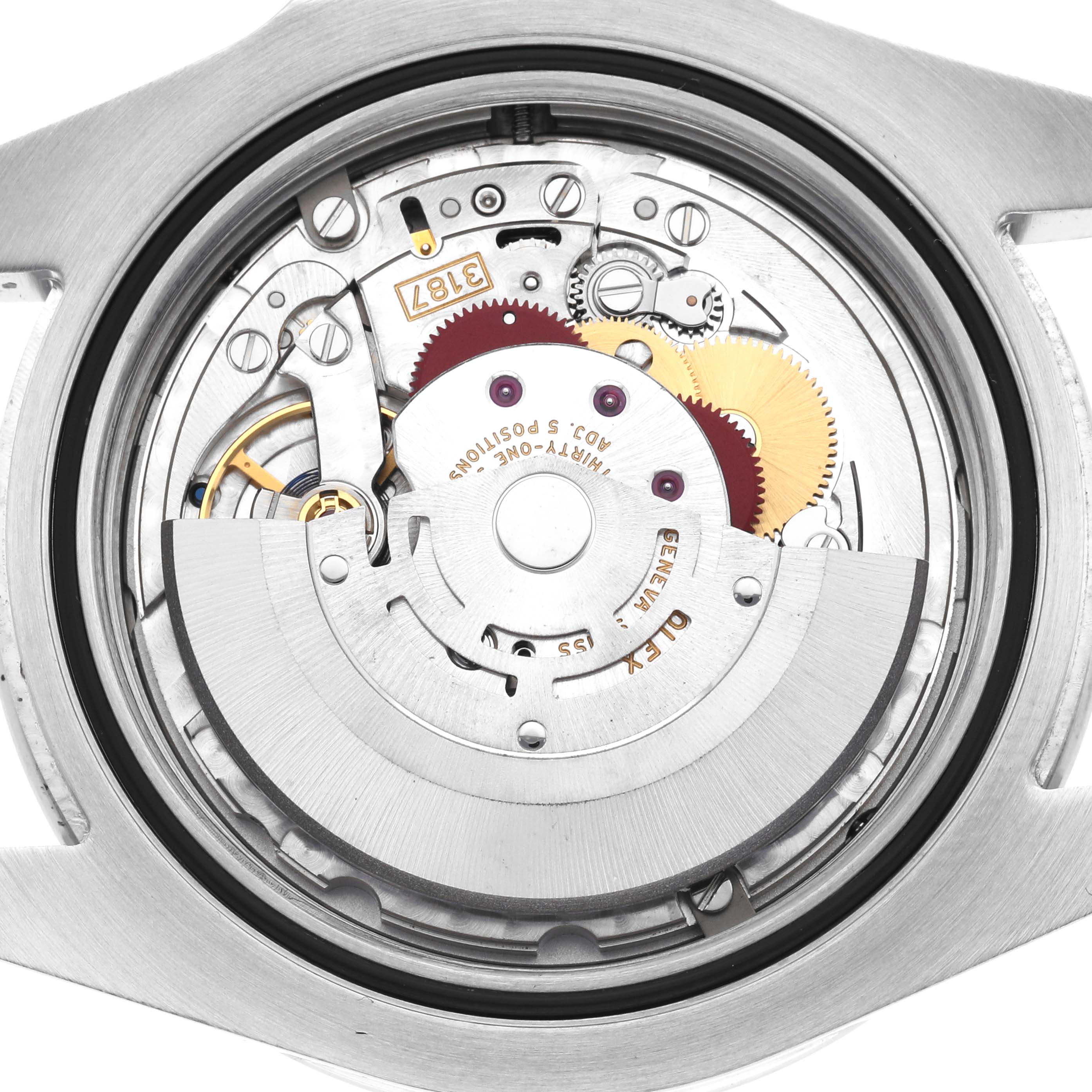 The image shows the internal mechanics of a Rolex Explorer 216570 Men's Stainless Steel Black Dial, highlighting the movement and gears from a back angle.