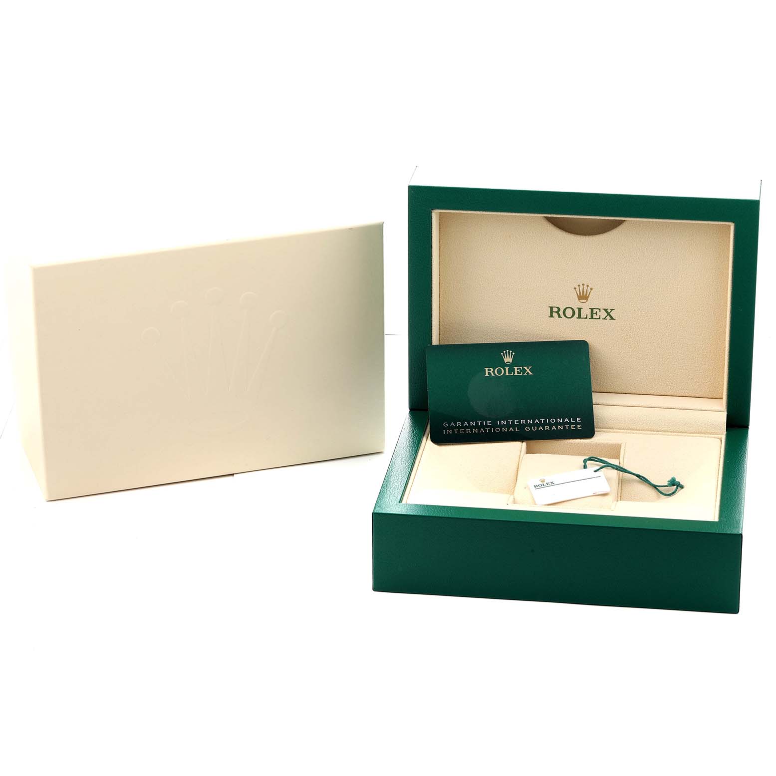 The image shows the Rolex Explorer 226570 Men
s Stainless Steel White Dial model
s box open with a guarantee card and hang tag, alongside its outer packaging.