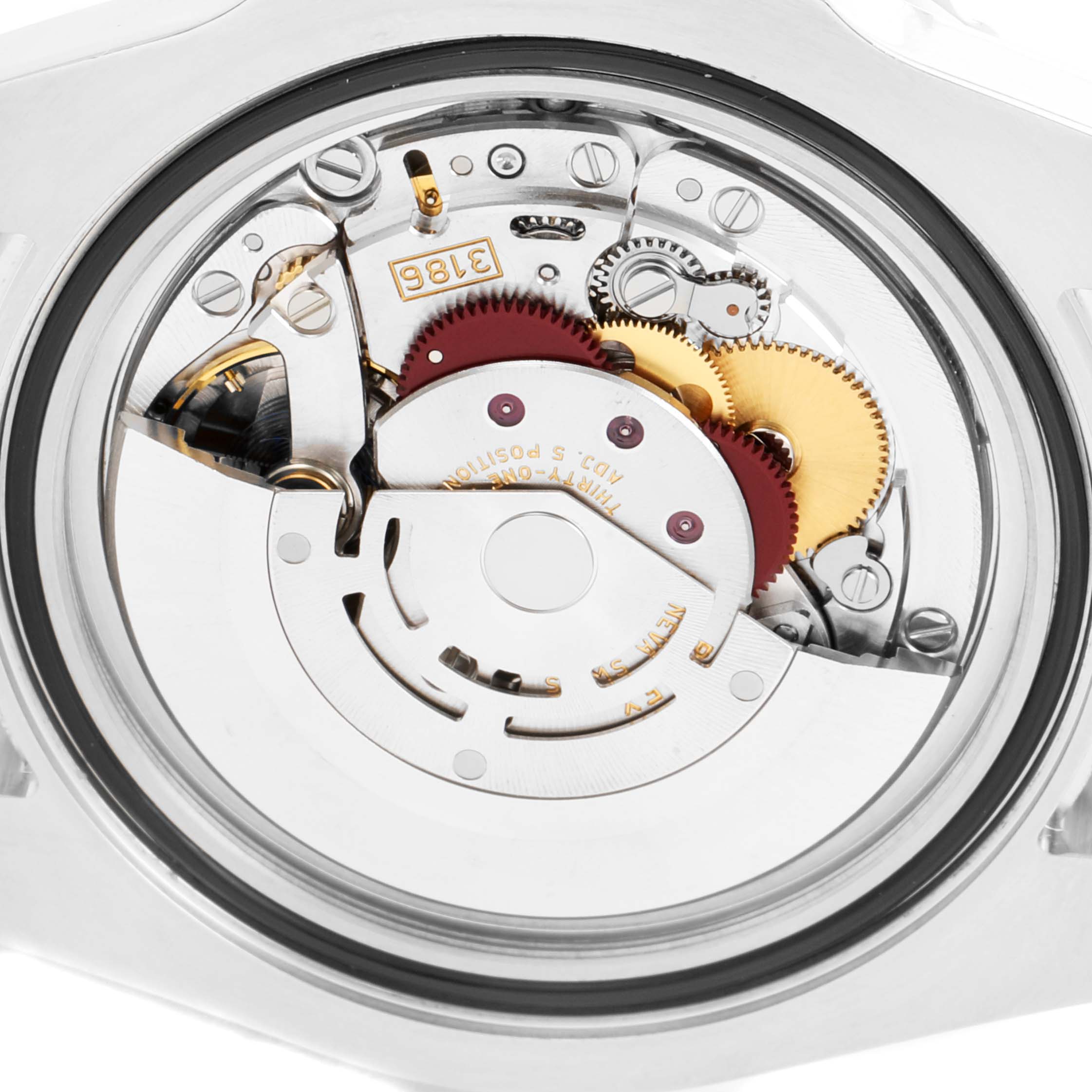 The image shows the internal mechanism (movement) of the Rolex GMT-Master 116710 Men
s Stainless Steel Black Dial 116710 Men
s Stainless Steel Black Dial watch from a rear angle.