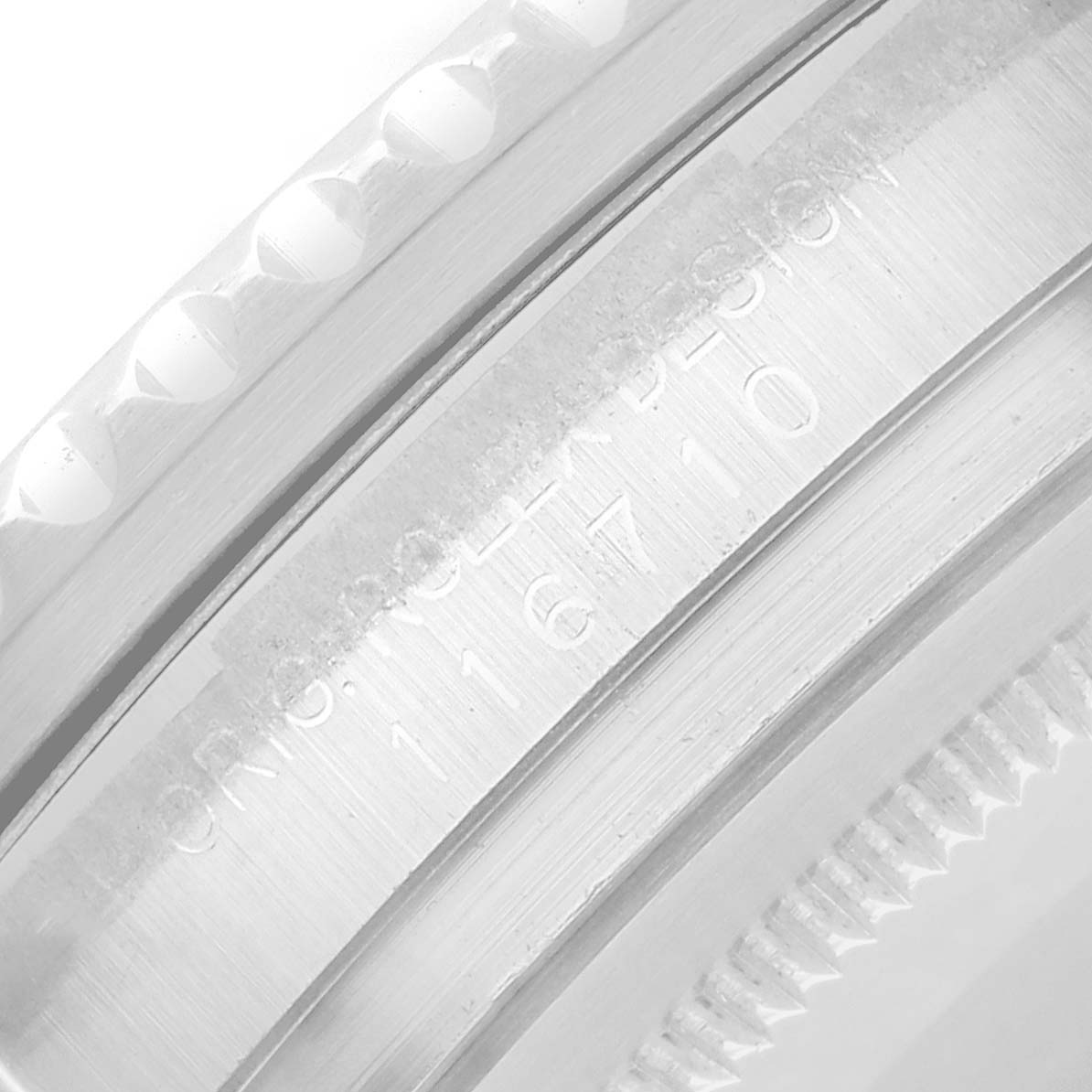 The image shows a close-up of the inner bezel with engraved details of the Rolex GMT-Master 116710 Men
s Stainless Steel Black Dial model.