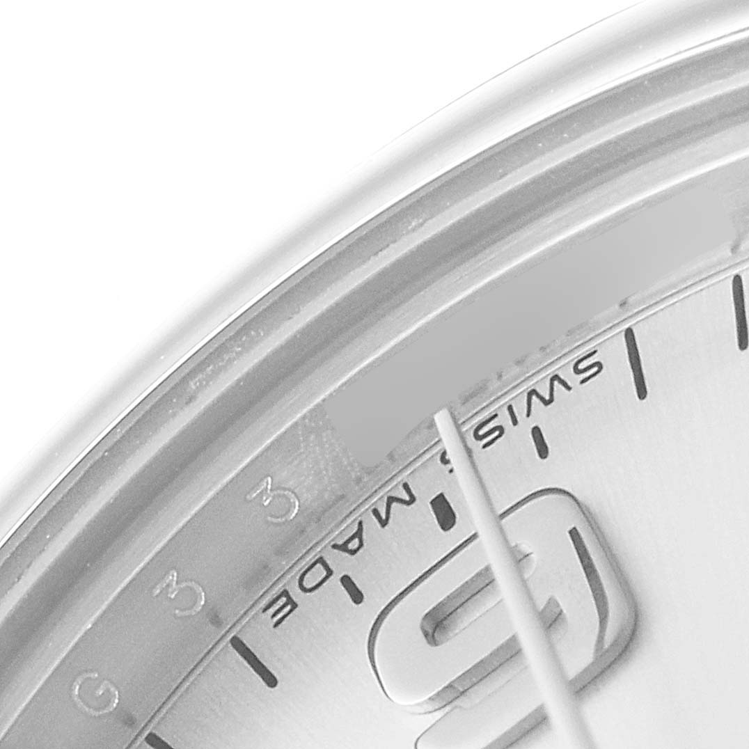The image shows a close-up of the dial
s edge, second hand, and part of the numeral 9 of a Rolex Mid-Size 177200 Women
s Stainless Steel Silver Dial 177200 Women
s Stainless Steel Silver Dial model watch.