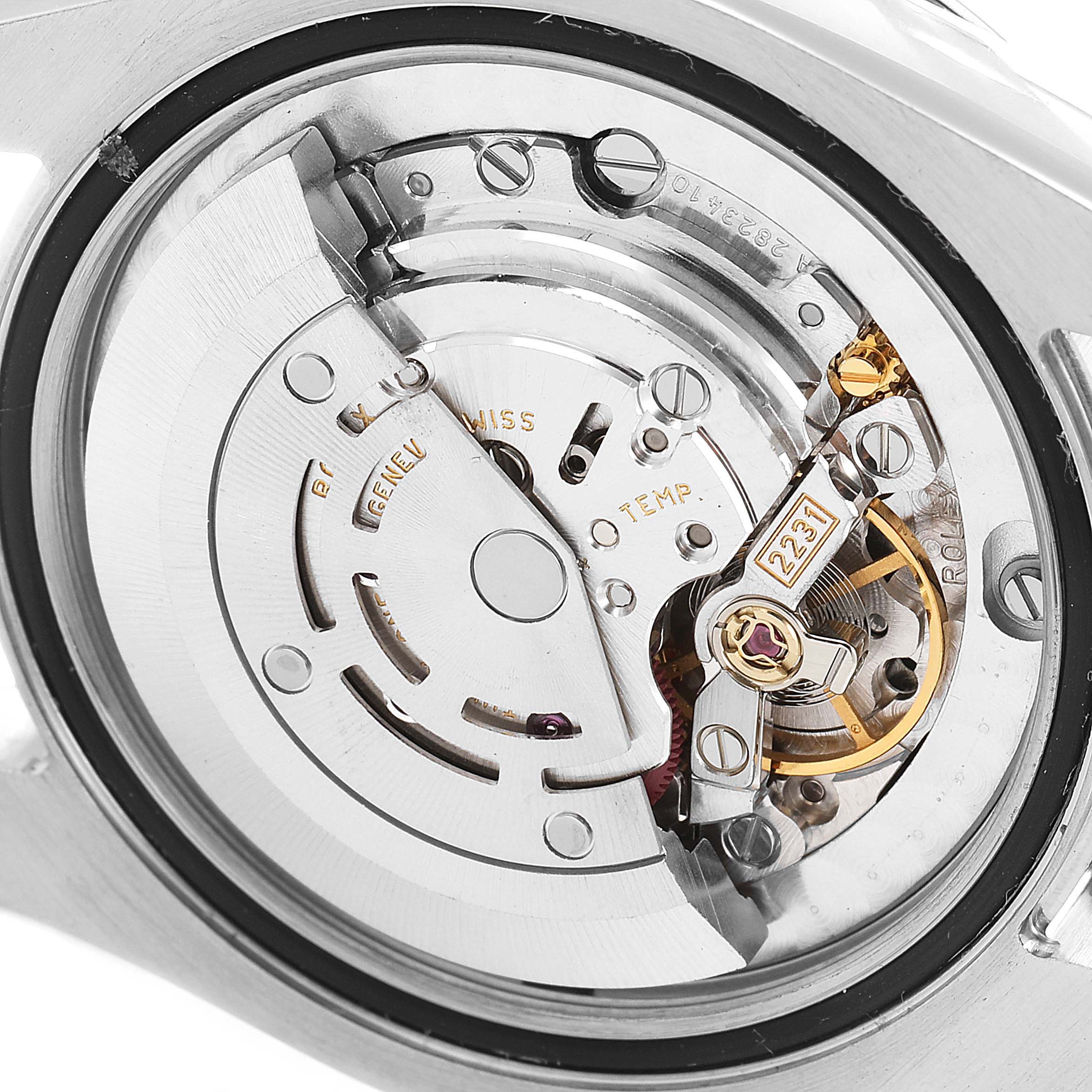 The image shows a close-up of the movement mechanism of a Rolex Mid-Size 177200 Women
s Stainless Steel Silver Dial 177200 Women
s Stainless Steel Silver Dial watch’s internal components.