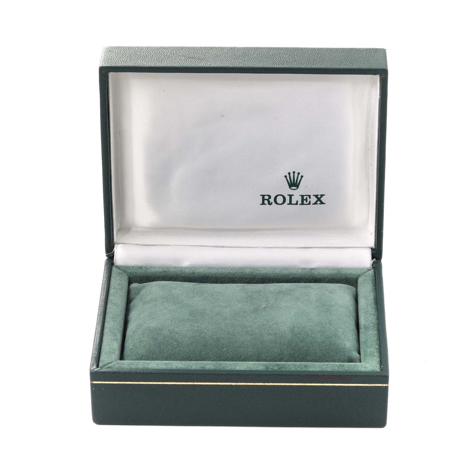 This image shows an open green Rolex box for a Mid-Size model watch, with a cushion inside.