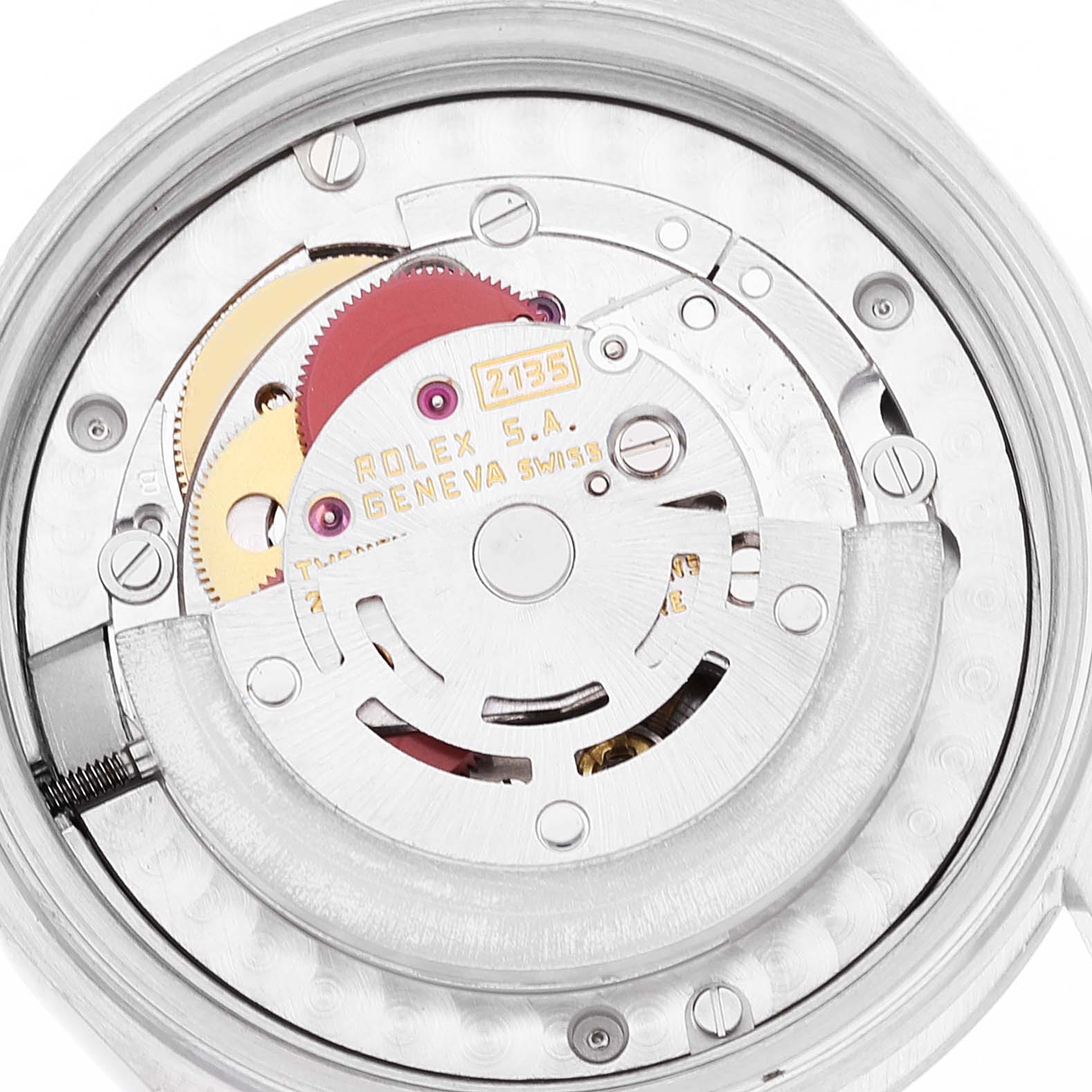 The image shows the internal mechanism and gears of a Rolex Mid-Size 68240 Women's Stainless Steel White Dial 68240 Women's Stainless Steel White Dial watch viewed from the back.