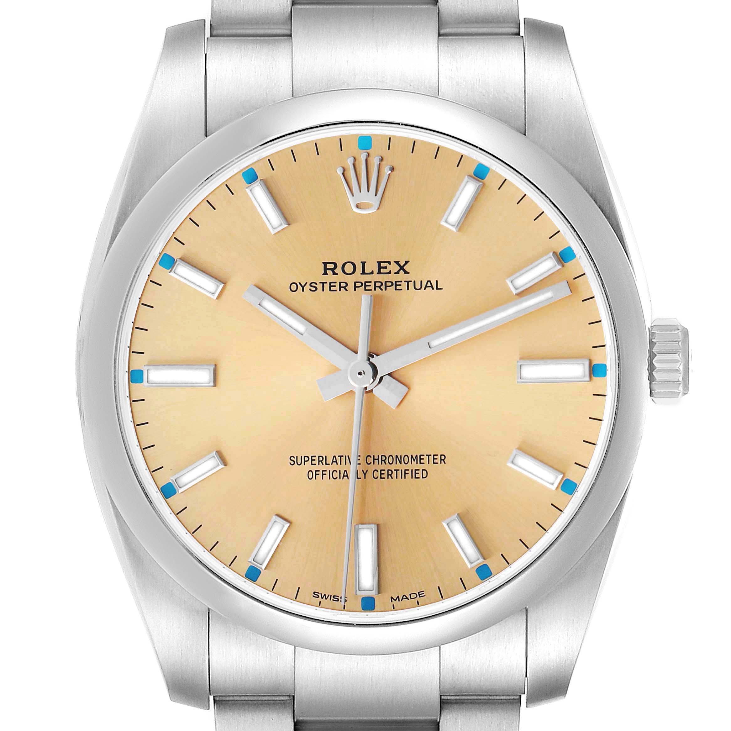 The Rolex Oyster Perpetual 114200 Men's Stainless Steel White Dial watch is shown from a frontal angle, highlighting the face, hands, hour markers, and part of the bracelet.