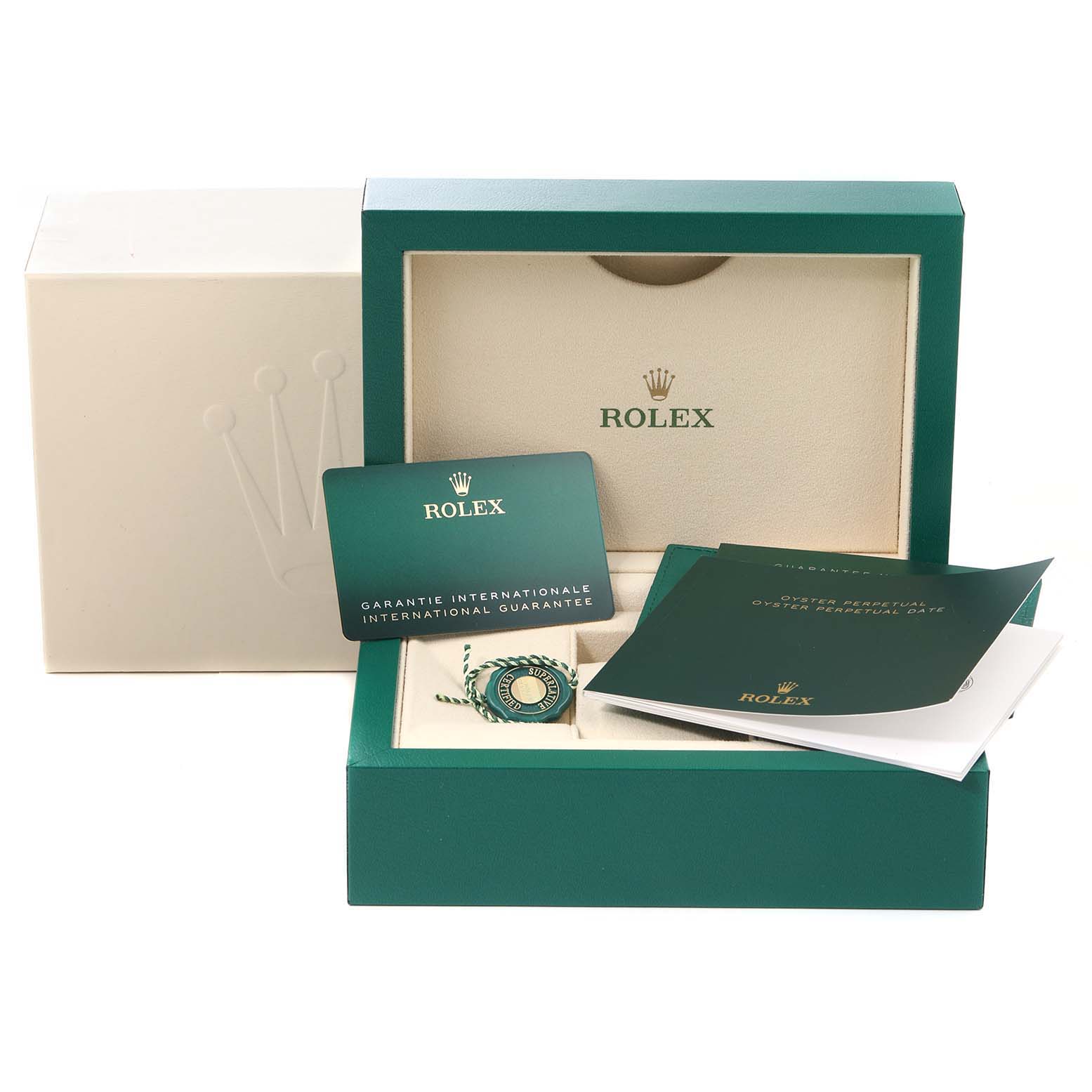 The image shows an open box with accessories, manuals, and a guarantee card for a Rolex Oyster Perpetual 114200 Men's Stainless Steel Champagne Dial 114200 Men's Stainless Steel Champagne Dial watch.