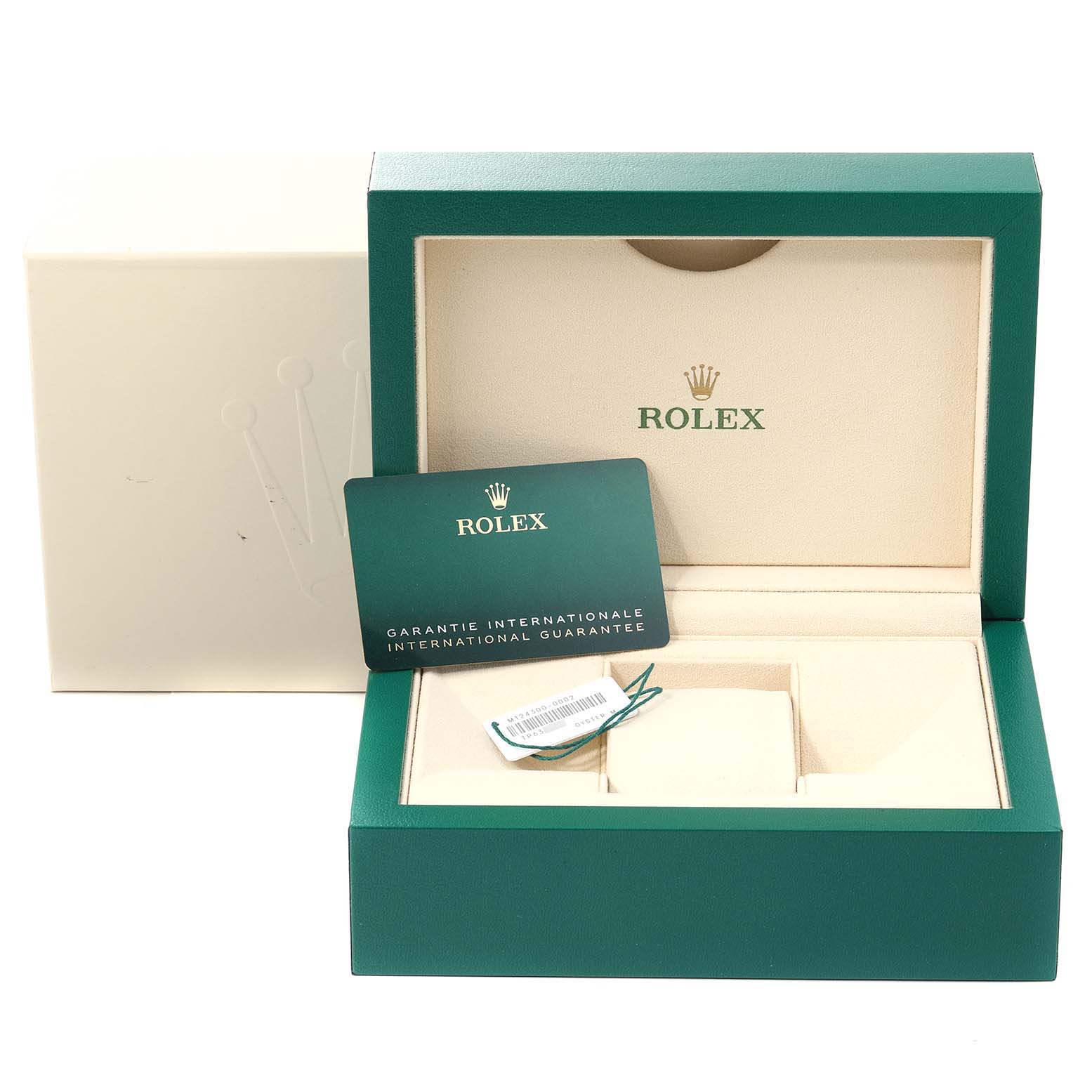 This image shows the open box, international guarantee card, and tag for the Rolex Oyster Perpetual 124300 Men
s Stainless Steel Black Dial 124300 Men
s Stainless Steel Black Dial watch.