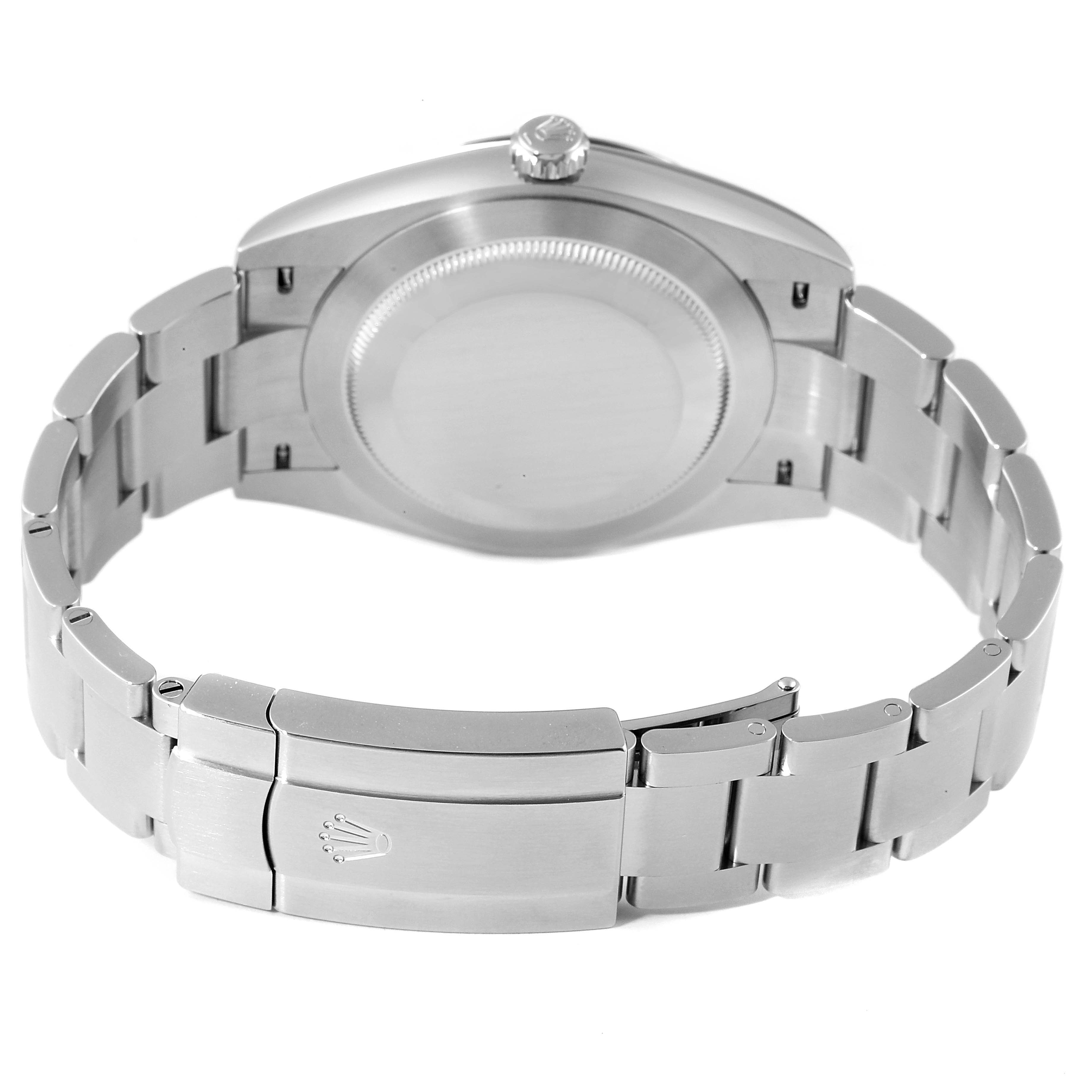 This image shows the back case and bracelet clasp of a Rolex Oyster Perpetual 124300 Men
s Stainless Steel Black Dial 124300 Men
s Stainless Steel Black Dial watch from a rear angle.