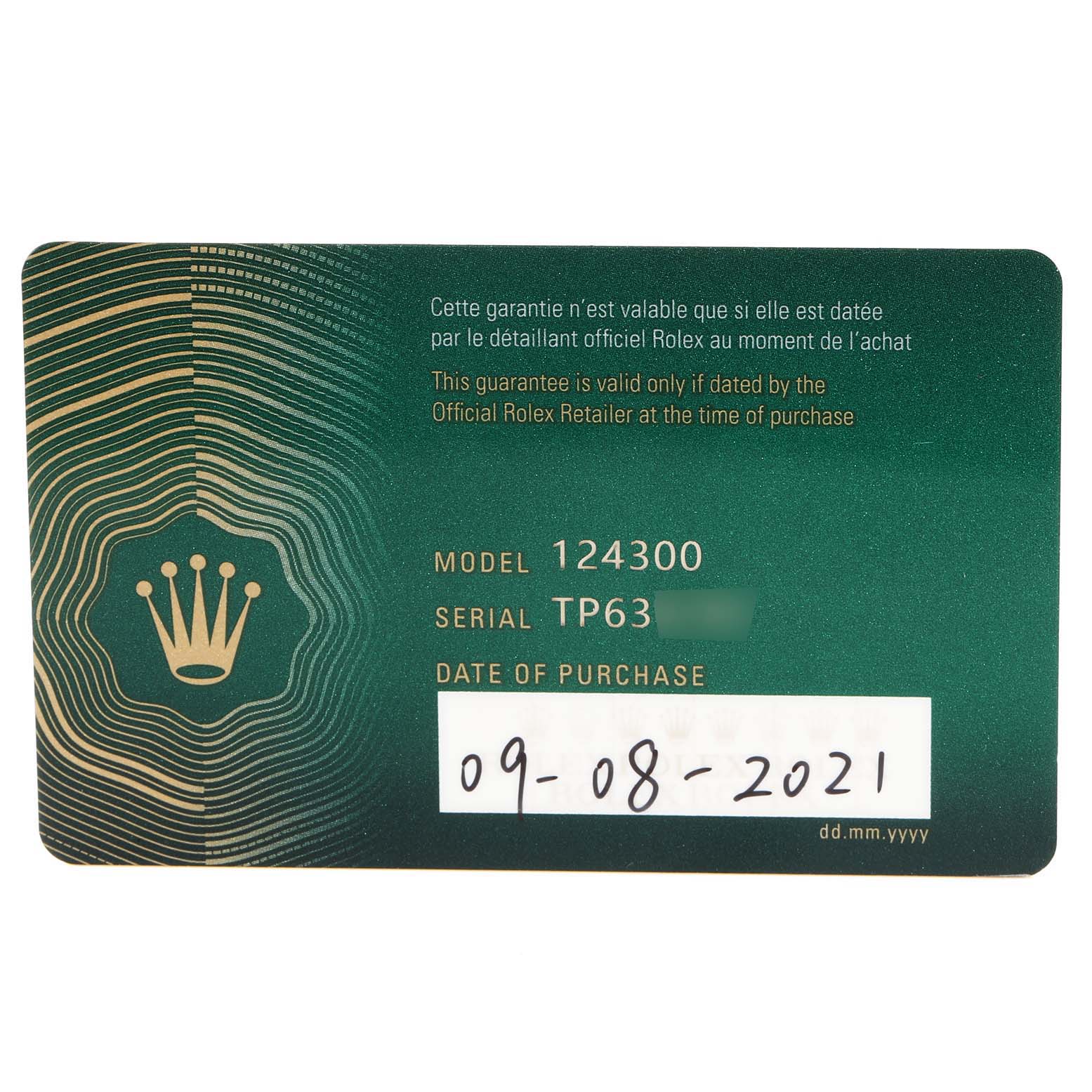 The image shows a Rolex warranty card for the Oyster Perpetual model 124300, displaying the serial number and purchase date.