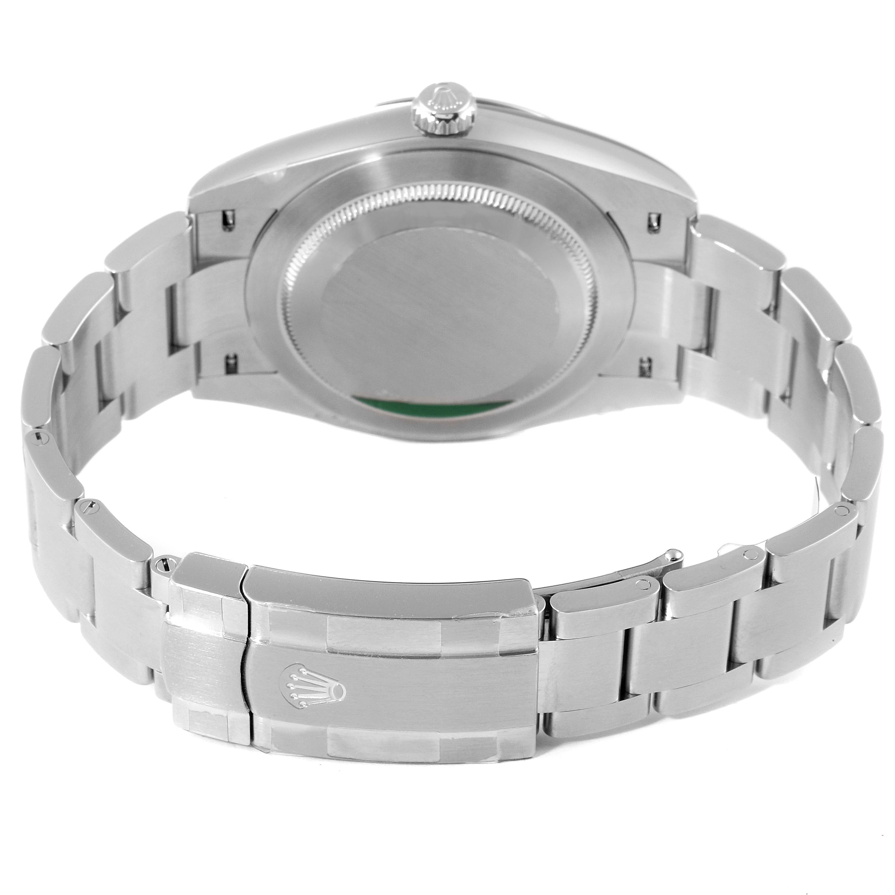 The image shows the back view of a Rolex Oyster Perpetual 124300 Men's Stainless Steel Silver Dial 124300 Men's Stainless Steel Silver Dial watch, highlighting the bracelet and the clasp.
