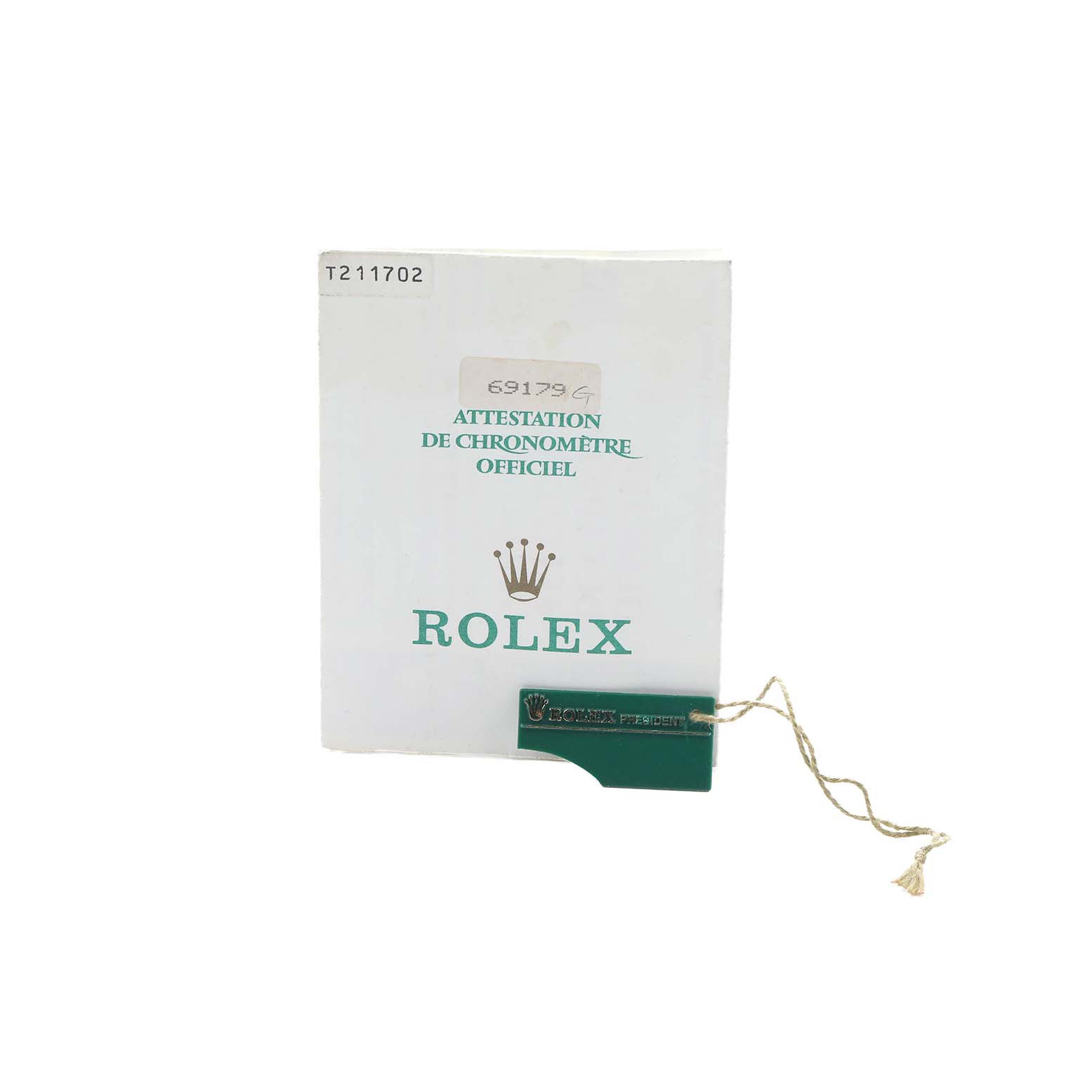 The image shows official documentation for a Rolex President 69179 Women
s White Gold Silver Dial model and a green Rolex tag.