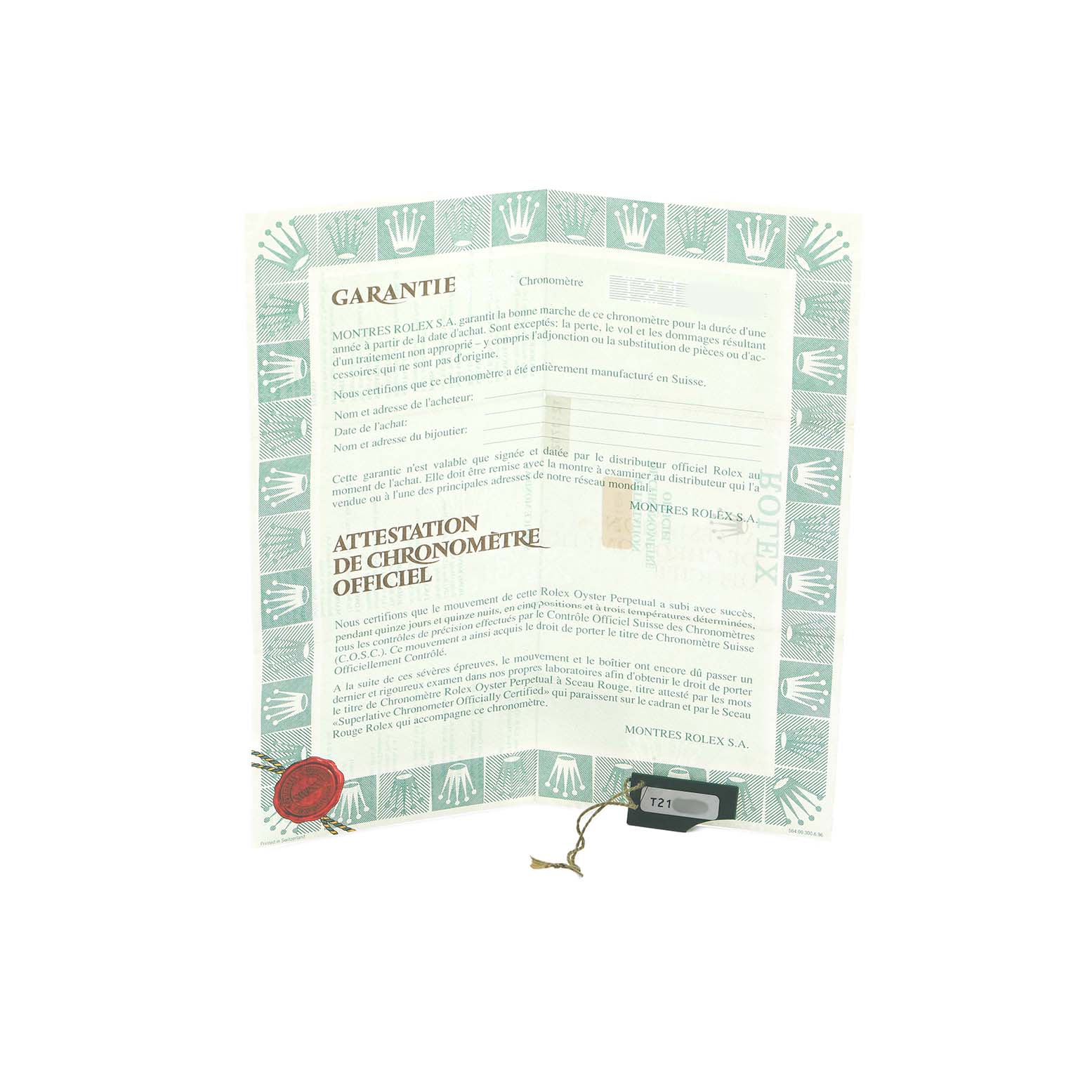 The image shows a Rolex President 69179 Women
s White Gold Silver Dial model warranty document with a green border featuring Rolex crowns, and a small black tag attached.