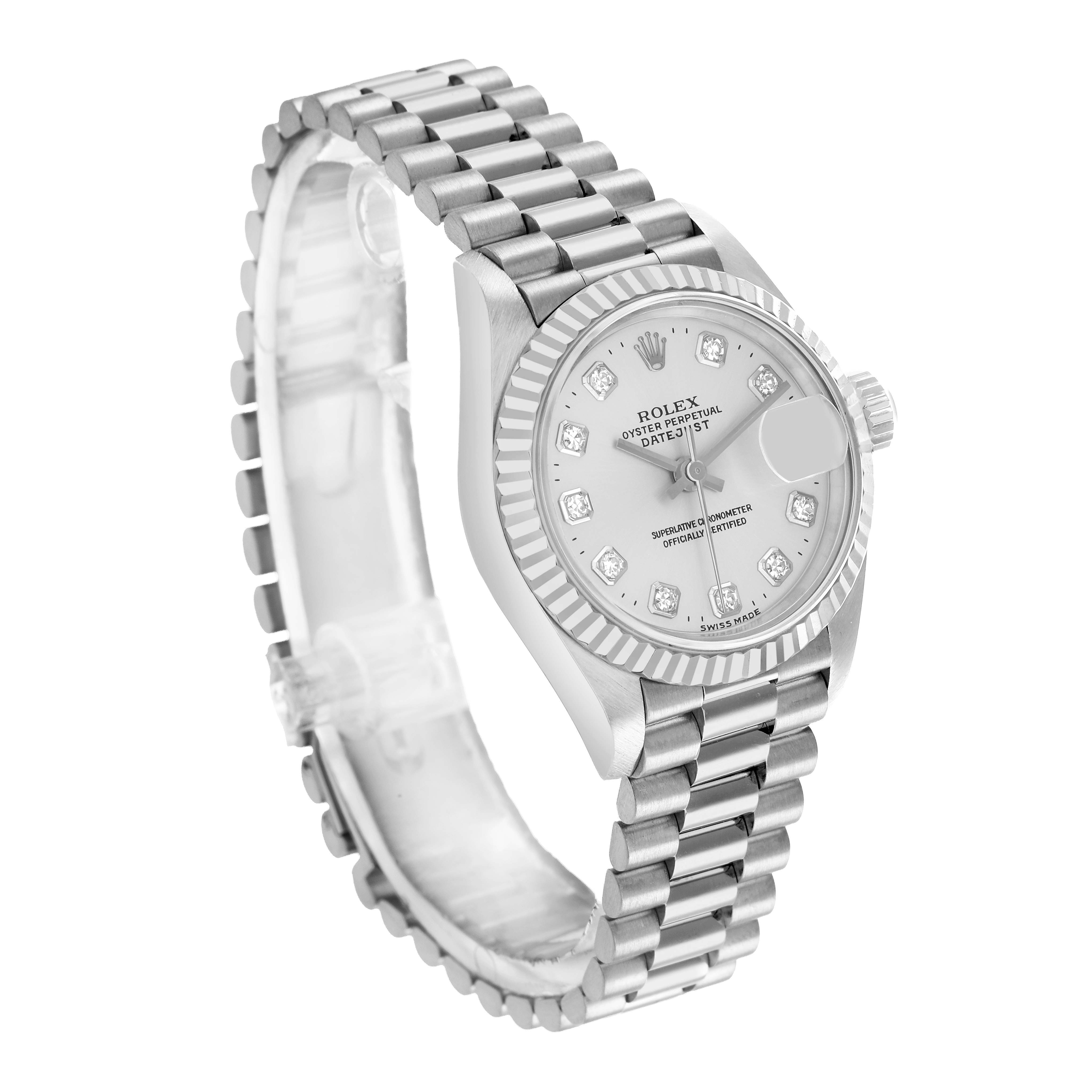 The Rolex President 69179 Women
s White Gold Silver Dial model watch is shown at a three-quarter angle displaying its face, bezel, and bracelet.