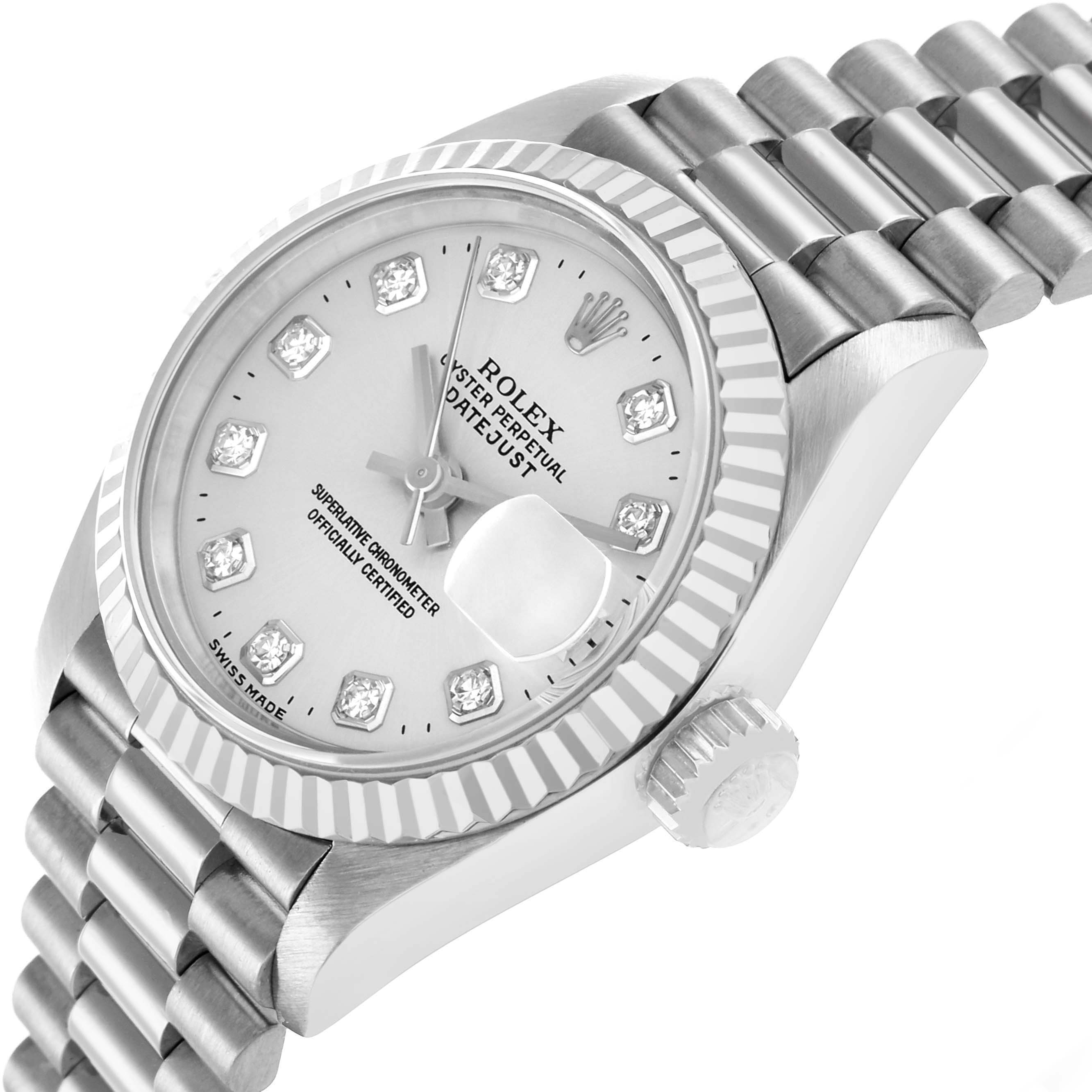 The Rolex President 69179 Women
s White Gold Silver Dial watch is shown from a three-quarter angle, highlighting its face, bezel, crown, and part of the bracelet.