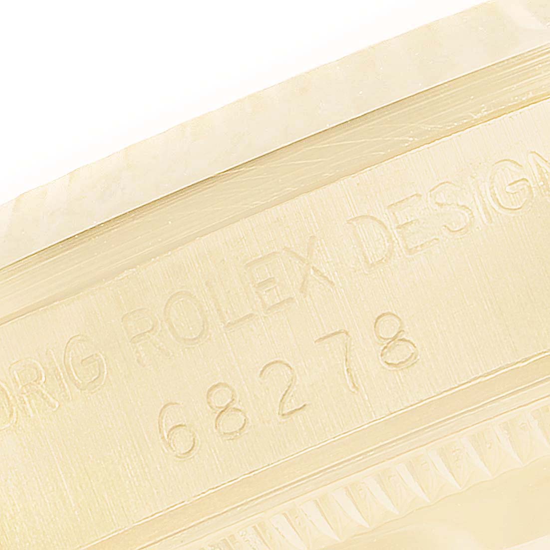 This image shows a close-up of the model and serial number engraving on a Rolex President 68278 Women's Yellow Gold Champagne Dial 68278 Women's Yellow Gold Champagne Dial watch.