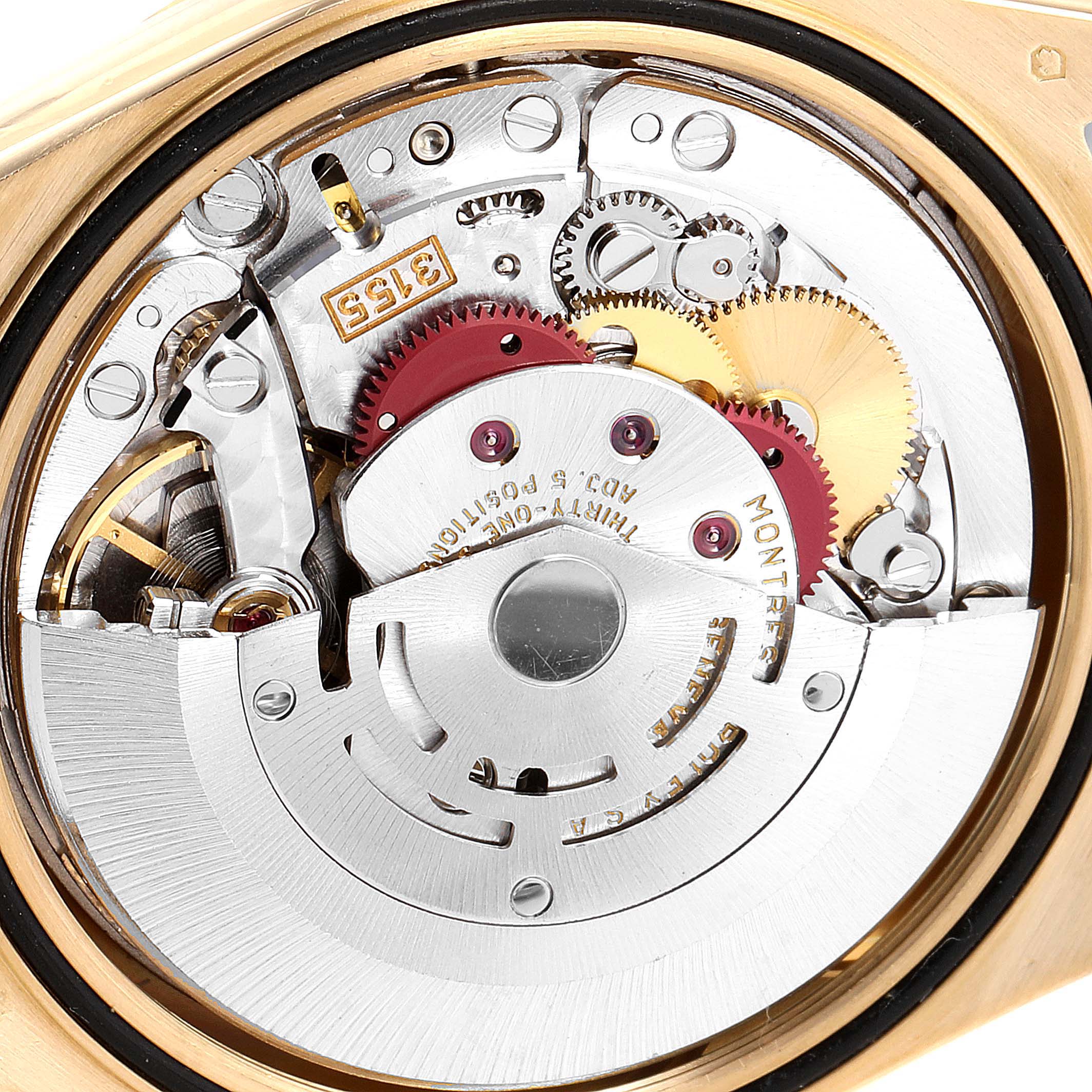 This image shows a close-up view of the Rolex President 18238 Men's Yellow Gold Mother of Pearl Dial 18238 Men's Yellow Gold Mother of Pearl Dial watch's intricate movement mechanisms.