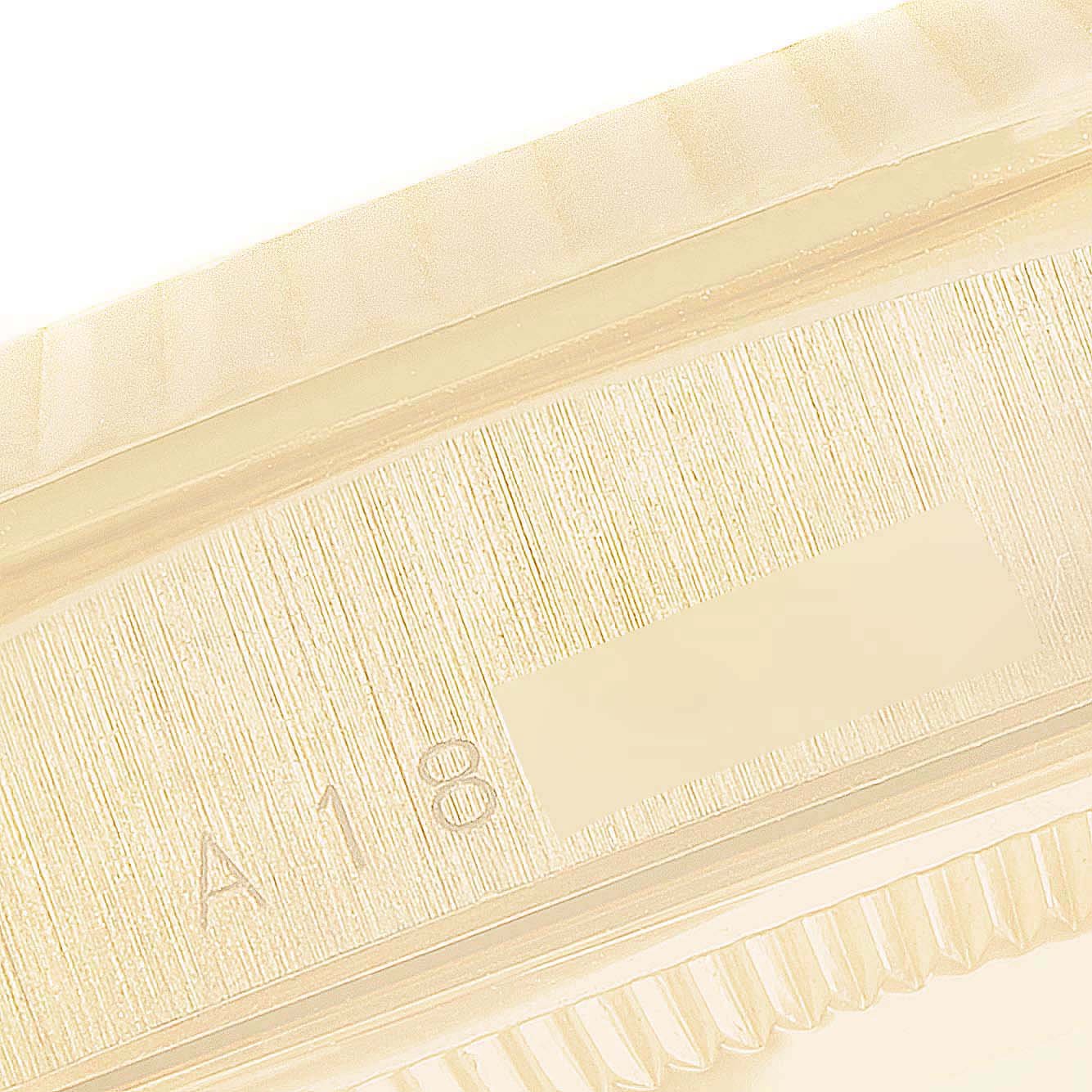 This is a close-up of the serial number area on the side of the Rolex President 18238 Men's Yellow Gold Champagne Dial 18238 Men's Yellow Gold Champagne Dial model watch case.
