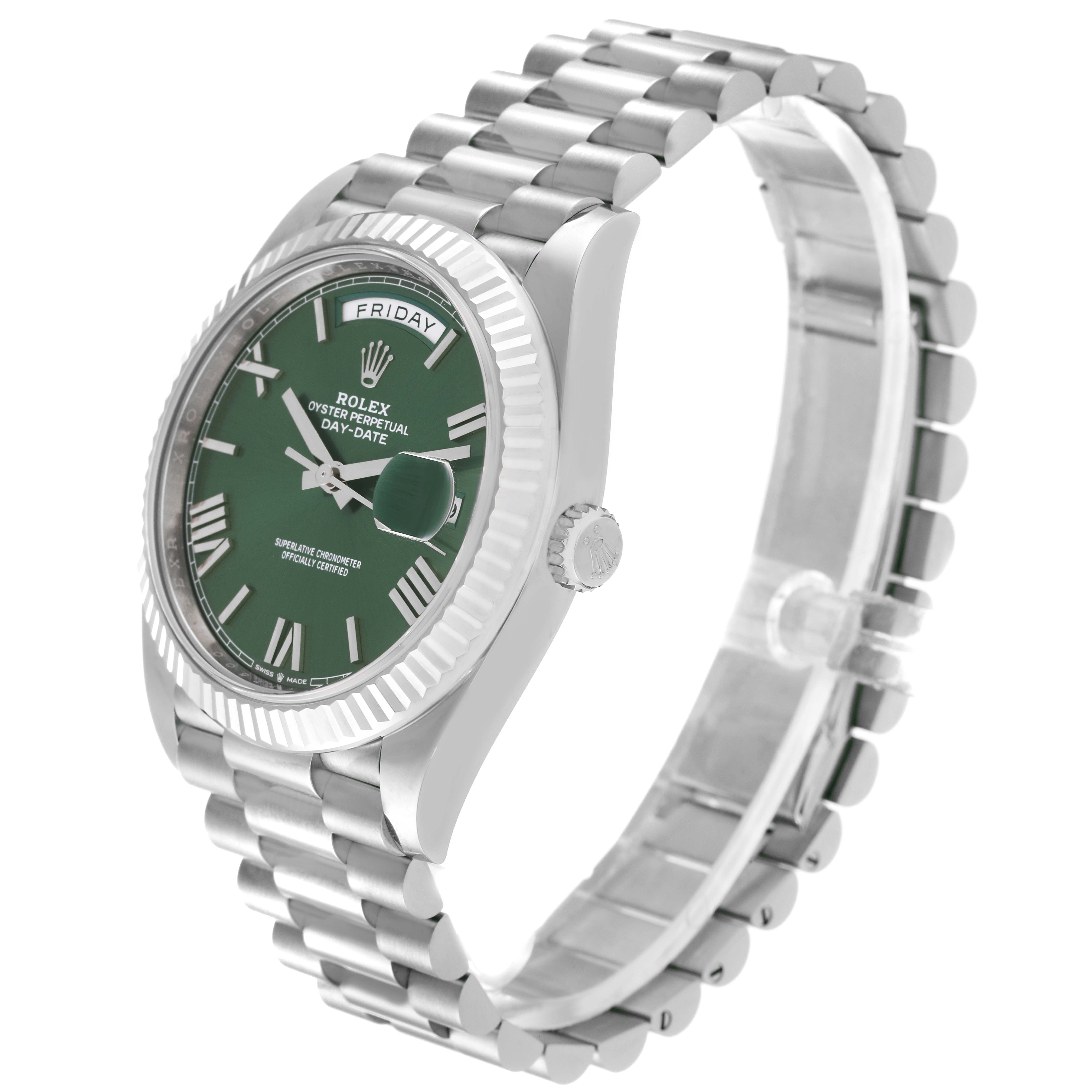 The Rolex President 228239 Men's White Gold Green Dial 228239 Men's White Gold Green Dial watch model is shown at a slight angle, displaying its green dial, fluted bezel, and President bracelet.