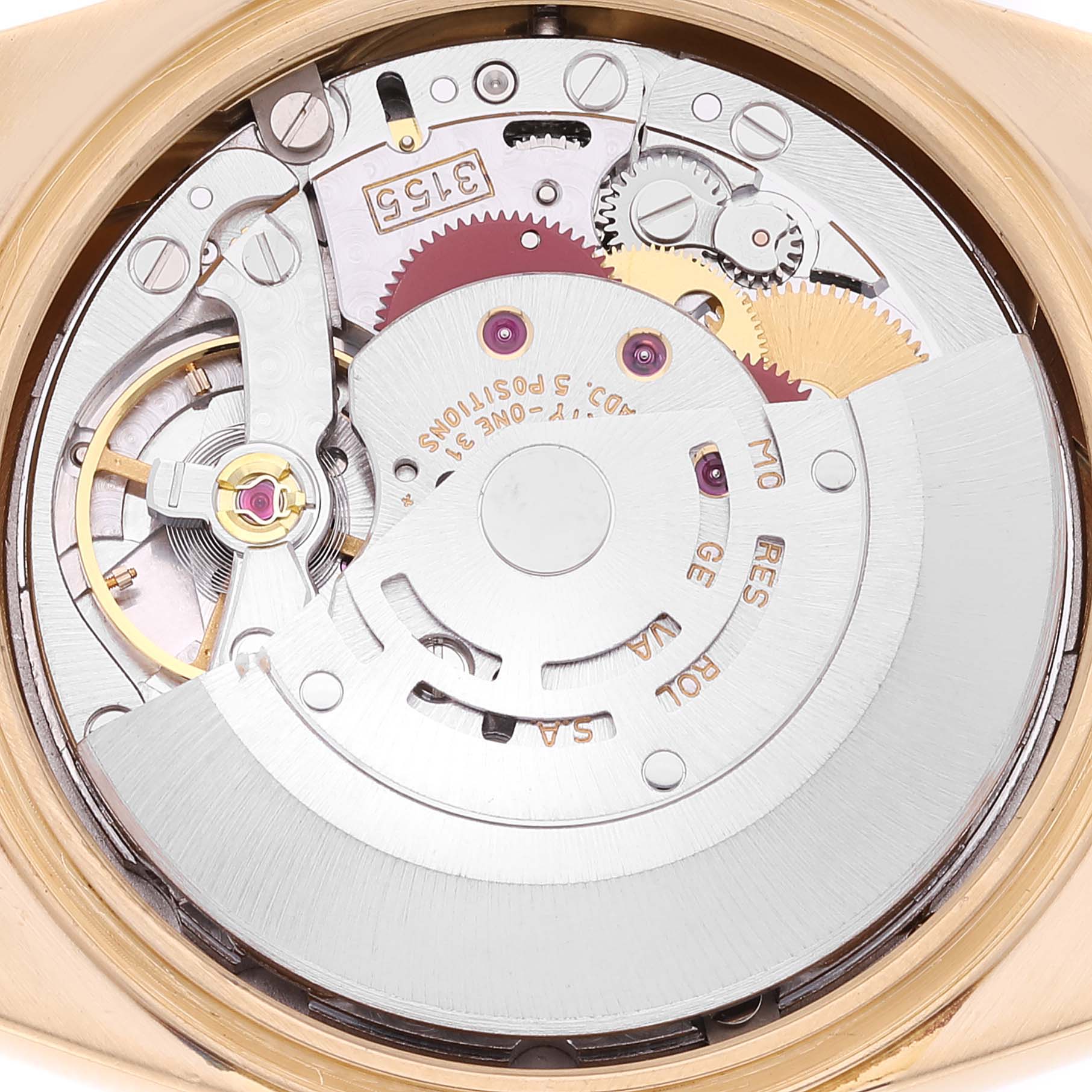 This image shows the inner mechanical movement of a Rolex President 18238 Men's Yellow Gold Champagne Dial 18238 Men's Yellow Gold Champagne Dial model watch from the back, highlighting gears and components.