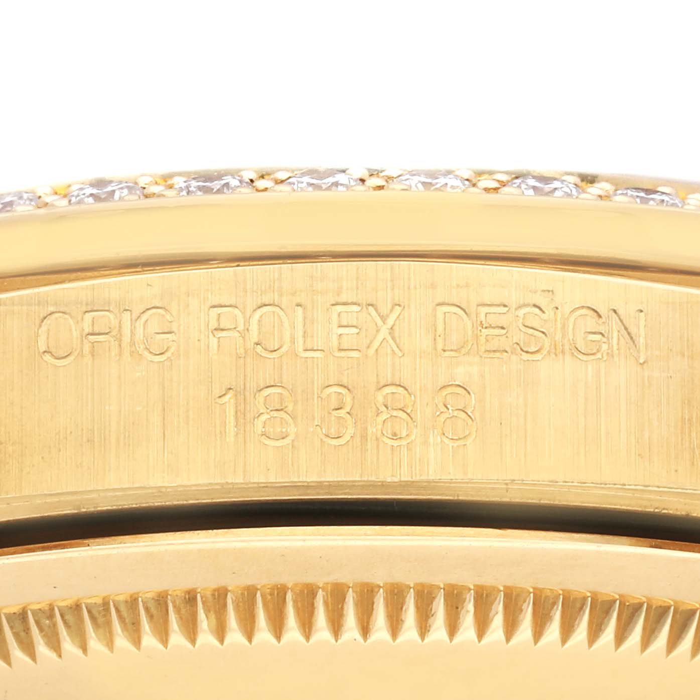 This close-up angle shows the side of the Rolex President 18388 Men's Yellow Gold Champagne Dial 18388 Men's Yellow Gold Champagne Dial watch with model number 18388 and part of its bezel.