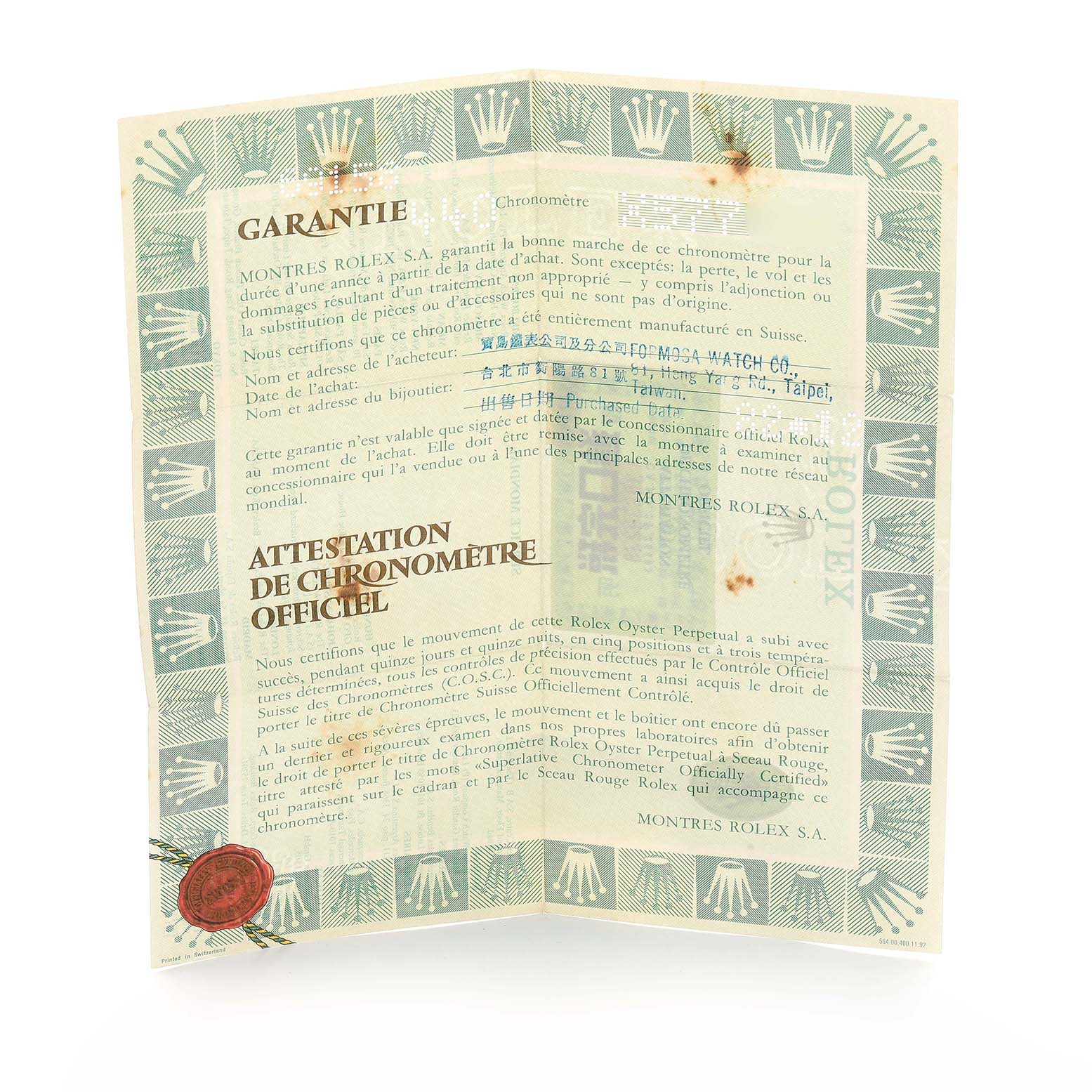 This image shows the warranty certificate for the Rolex President 69158 Women
s Yellow Gold Grey Dial model, featuring the Rolex branding and design.