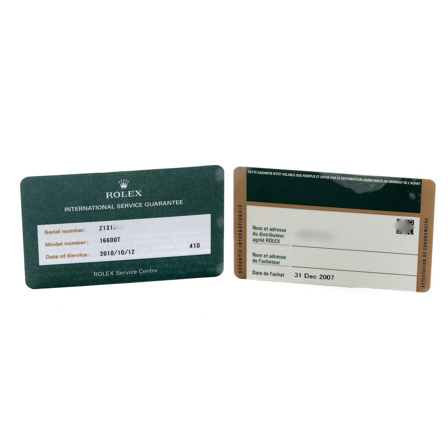 The image shows a pair of Rolex Sea-Dweller 16600 Men's Stainless Steel Black Dial service and warranty cards.