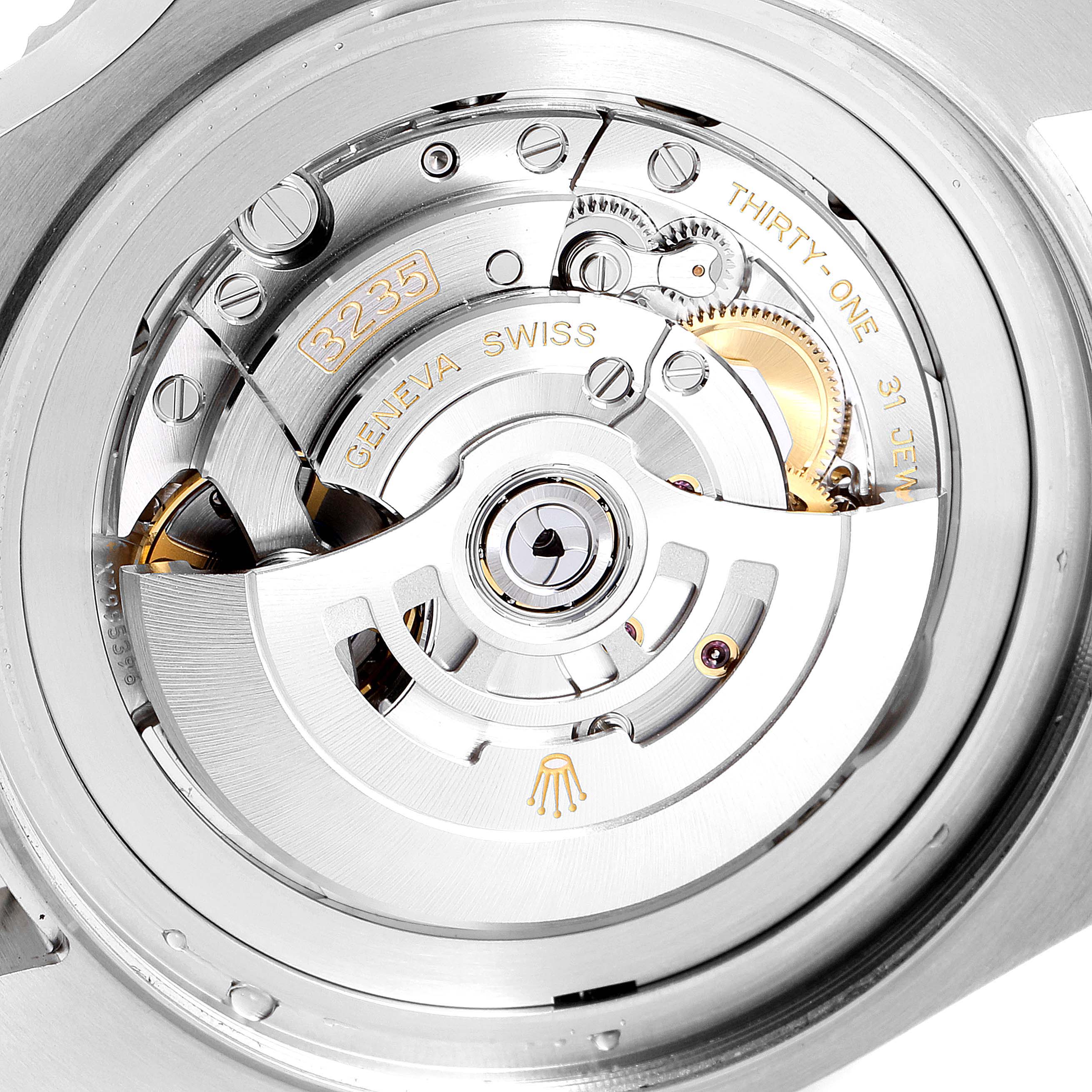 This image shows a close-up view of the movement mechanism in a Rolex Sea-Dweller 126660 Men's Stainless Steel Blue Dial 126660 Men's Stainless Steel Blue Dial watch.